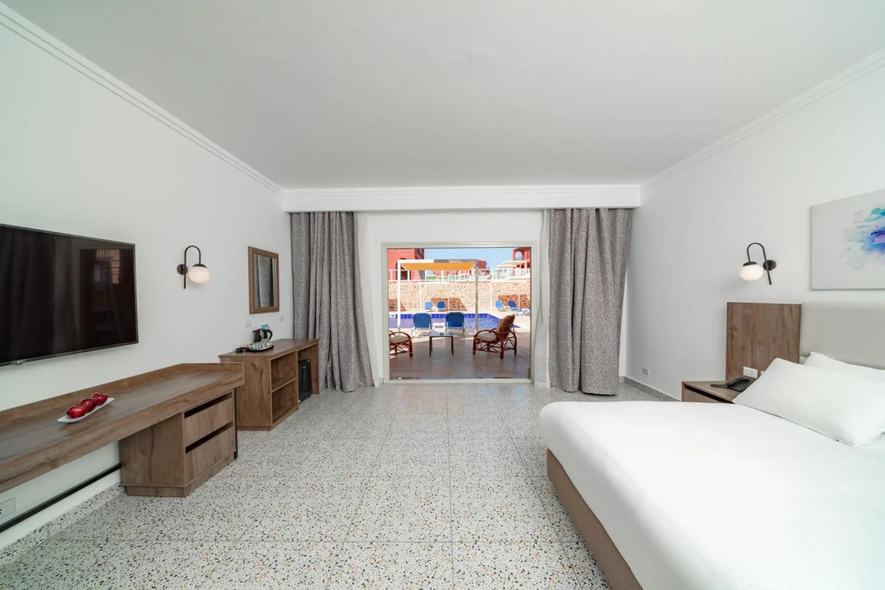 Deluxe Double or Twin Room with Pool View in Pickalbatros Vita Resort - Portofino Marsa Alam Deluxe Double or Twin Room with Pool View in Pickalbatros Vita Resort - Portofino Marsa Alam