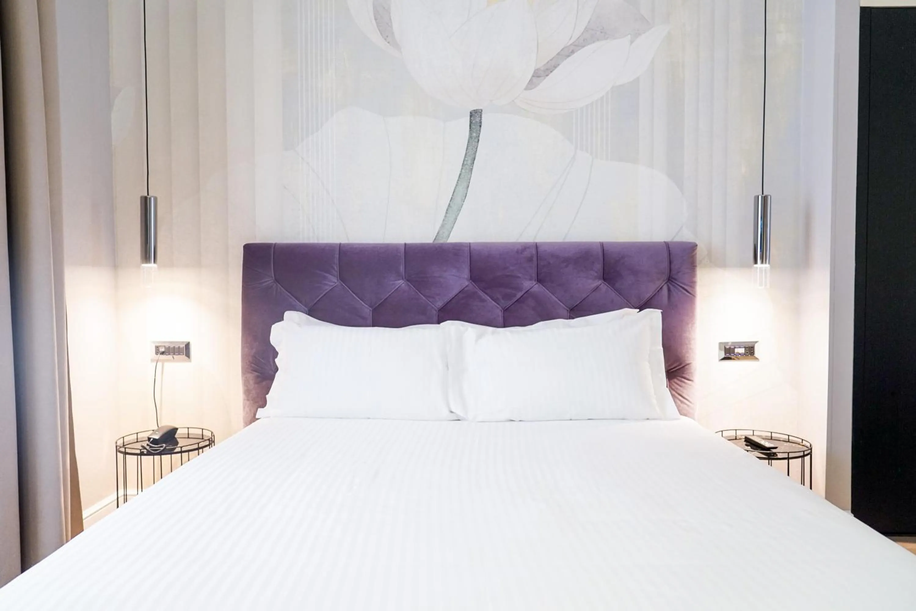 Bed in The Unique Hotel