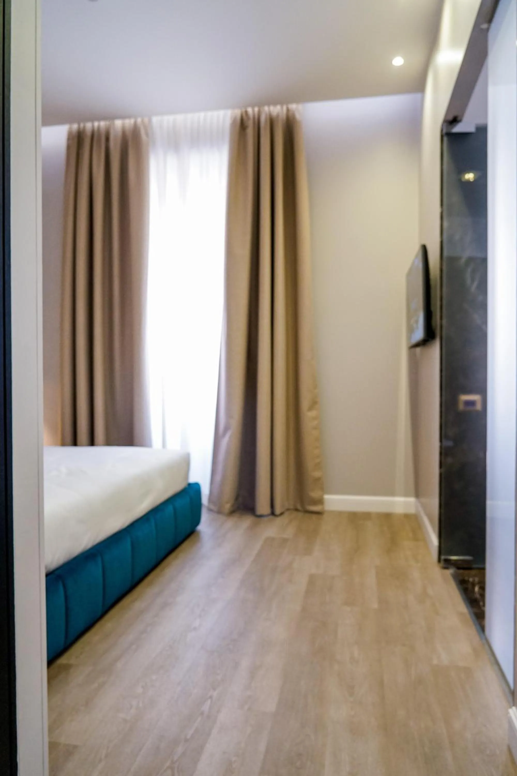 Bed in The Unique Hotel