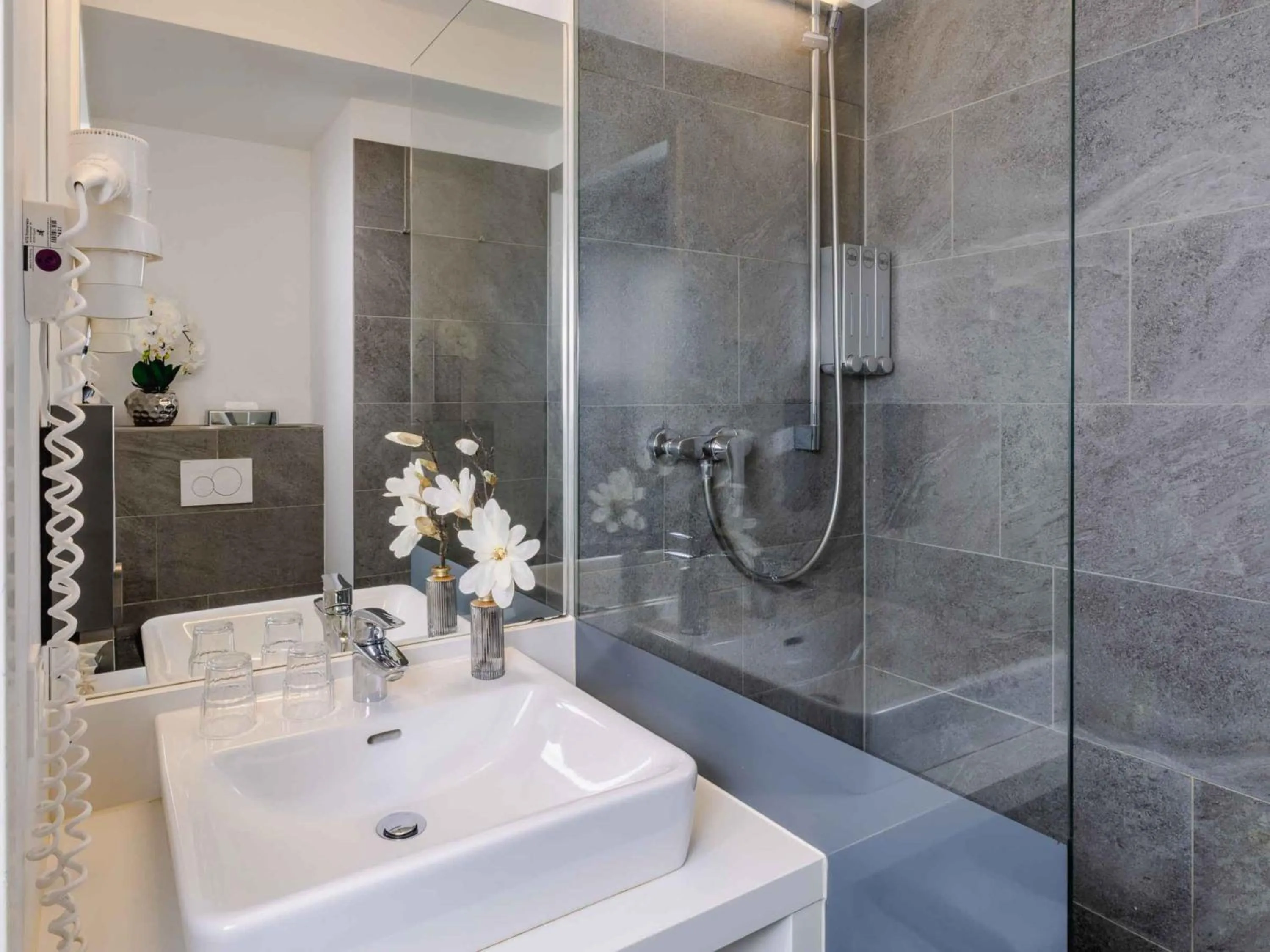 Bathroom in PLAZA INN Dachau - München