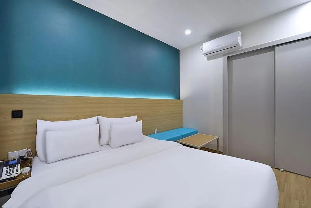 Bed in Hotel Calmrest