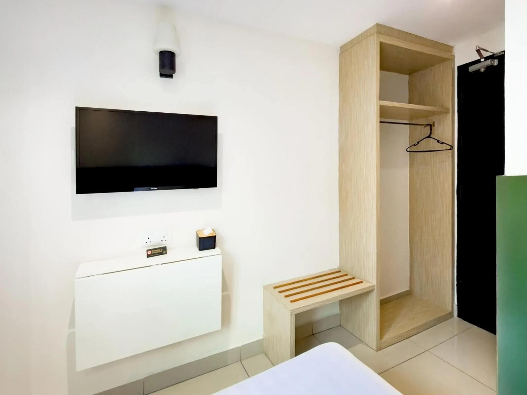 Bedroom in Living At DSulaiman Hotel