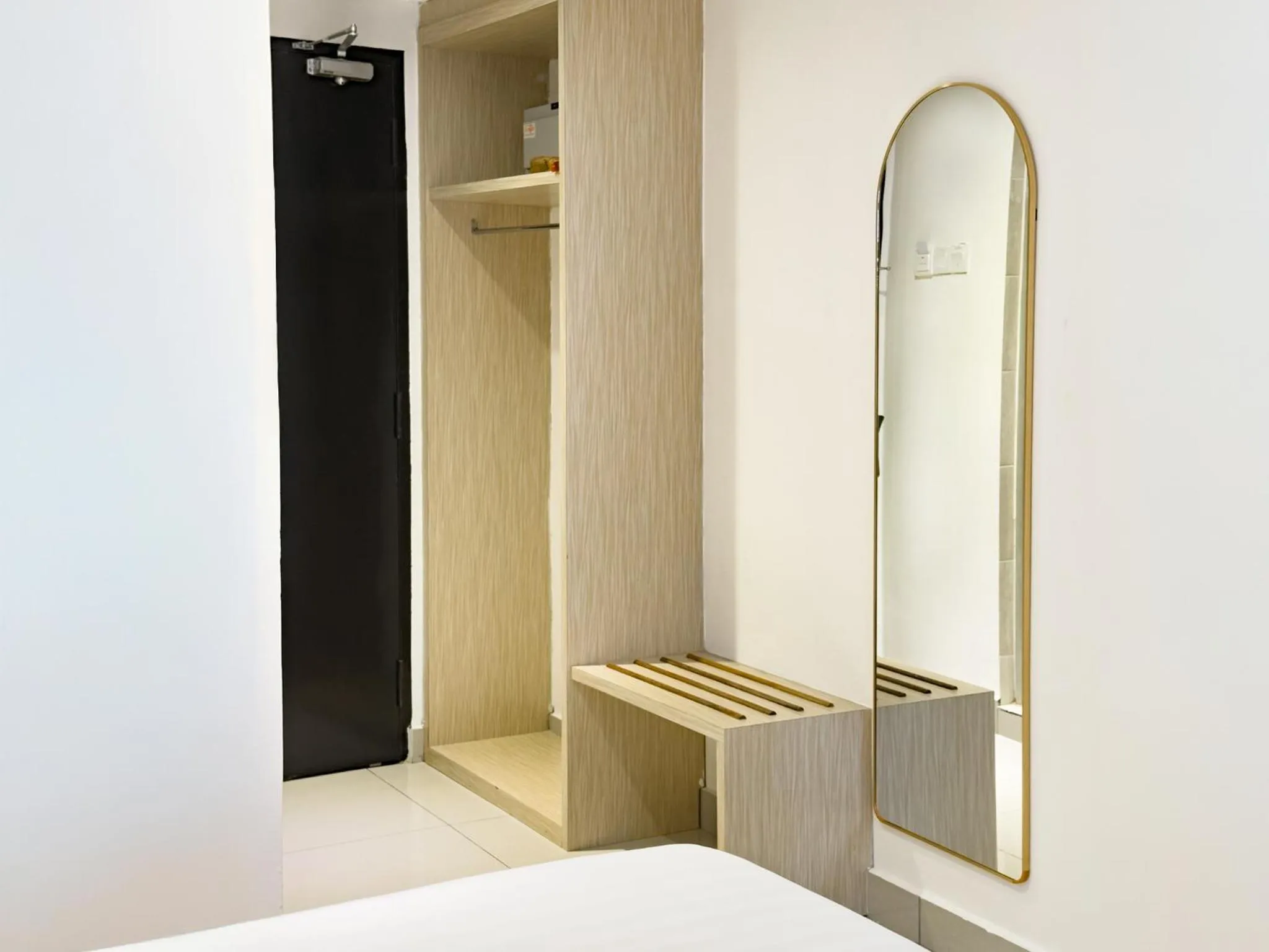 Bedroom in Living At DSulaiman Hotel