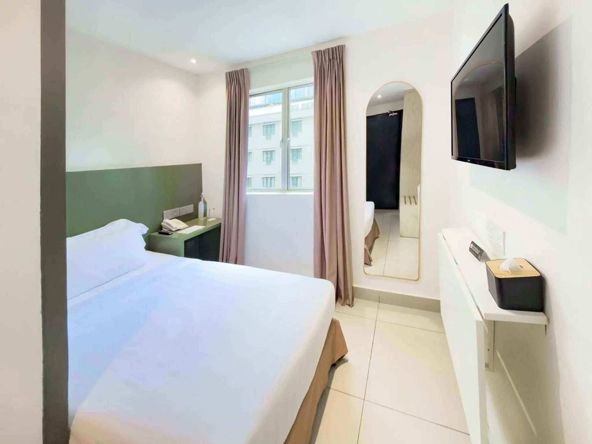 Bedroom, Bed in Living At DSulaiman Hotel