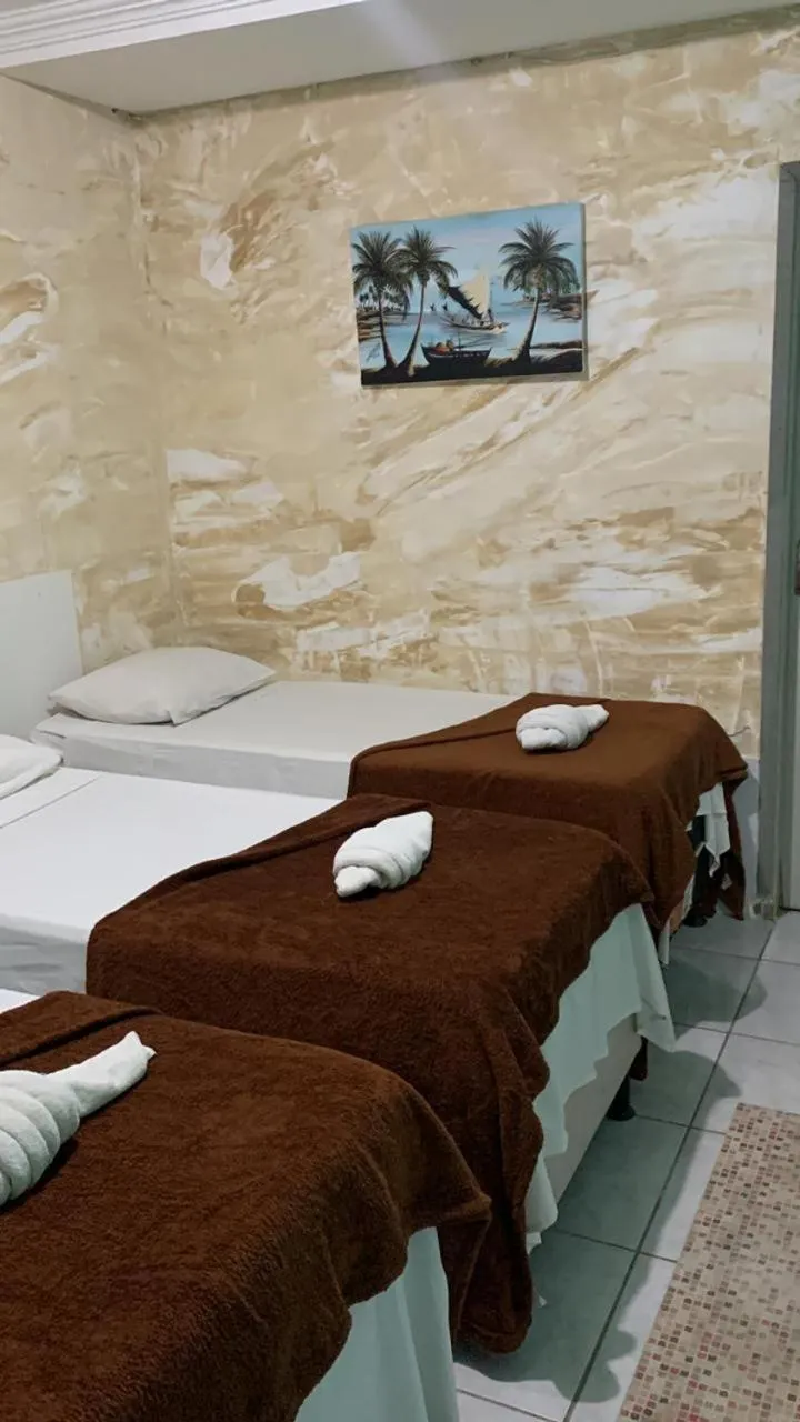 Bed in Pousada Casa Porto