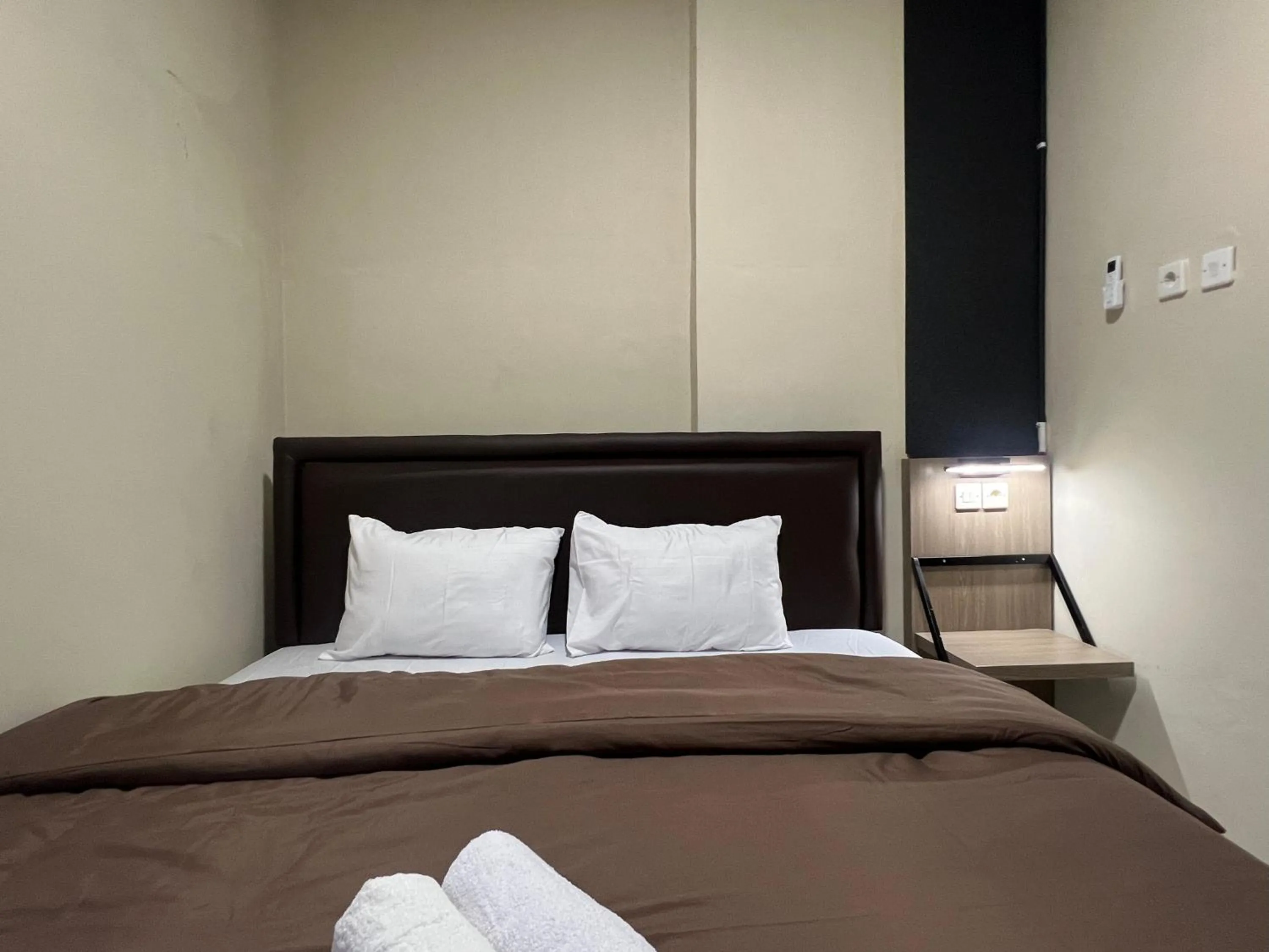 Bed in Brenn Hotel Semarang Mitra Reddoorz