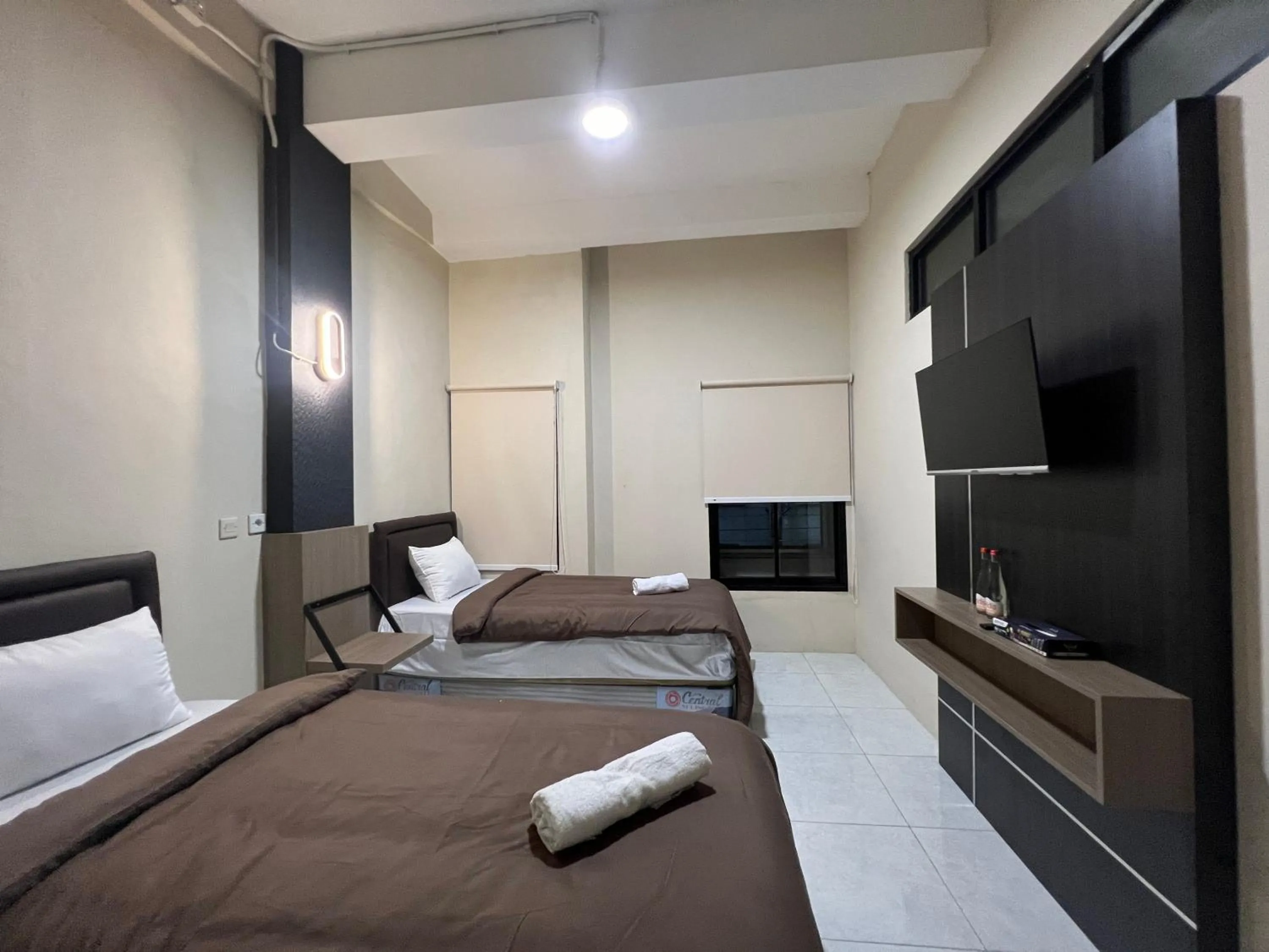 Bed in Brenn Hotel Semarang Mitra Reddoorz