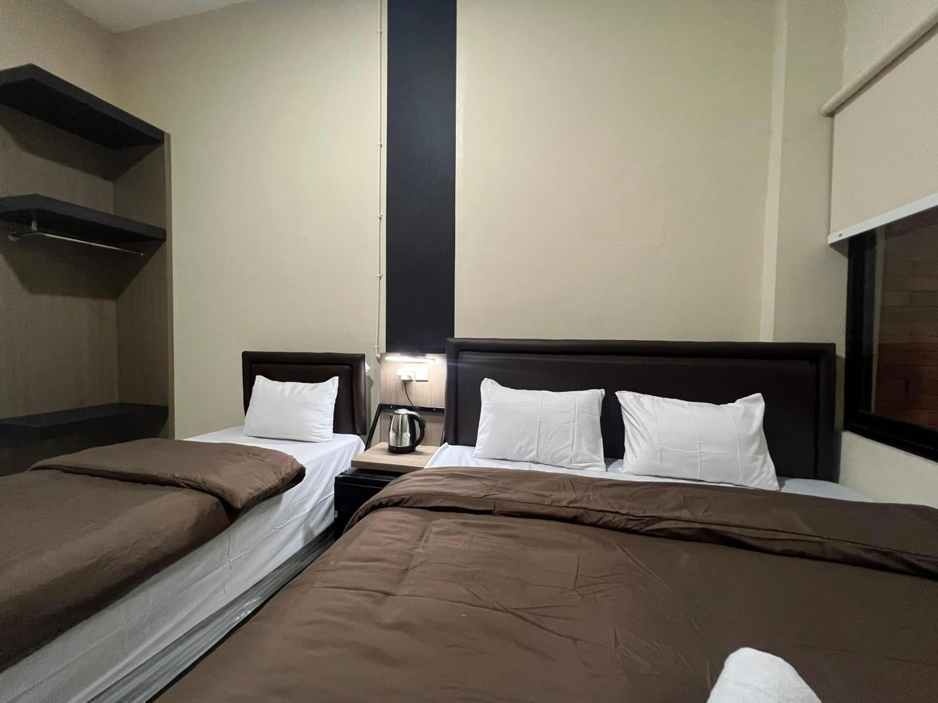 Bed in Brenn Hotel Semarang Mitra Reddoorz