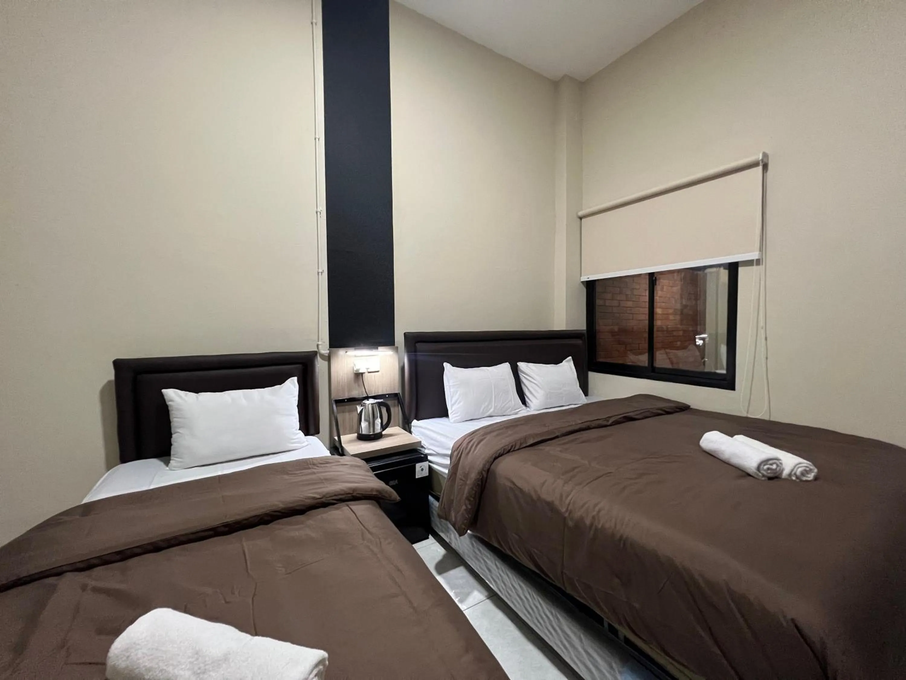 Bed in Brenn Hotel Semarang Mitra Reddoorz
