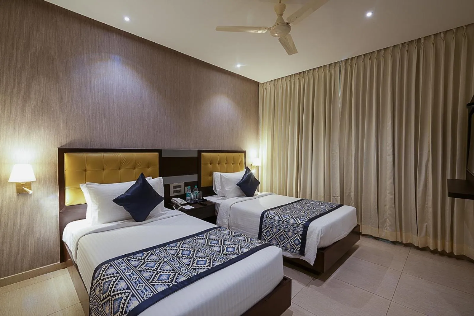 Bedroom, Bed in Grand Continent Malleshwaram A Sarovar Portico Affiliate Hotel