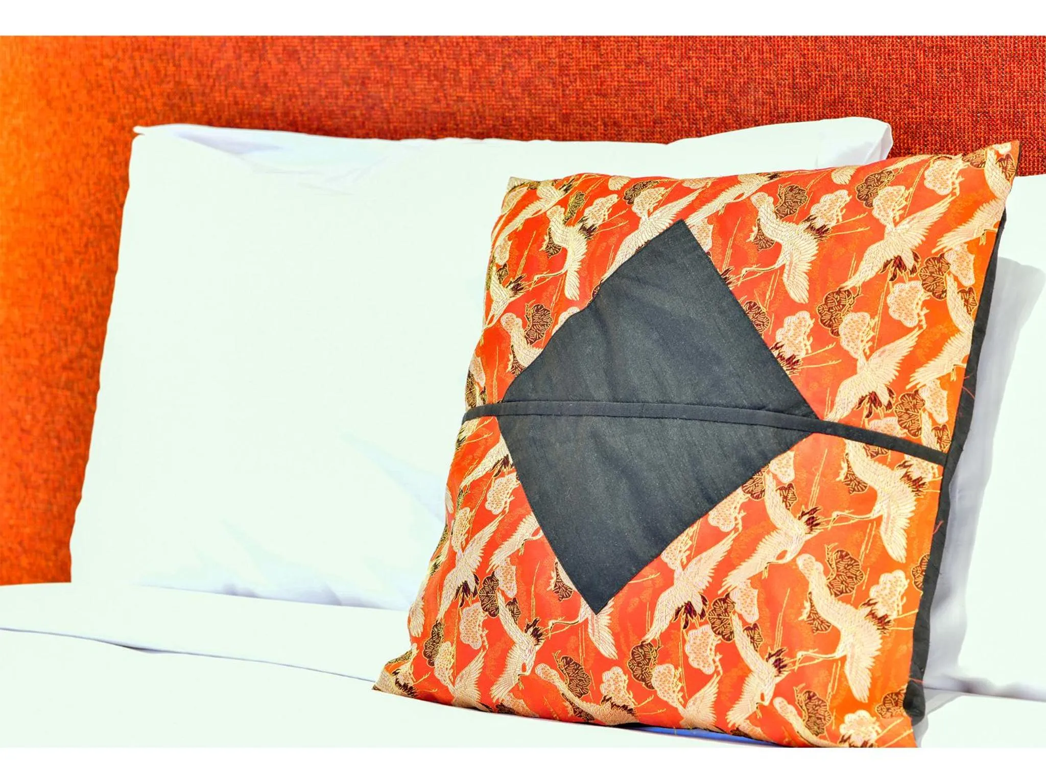 Bed in Crossroads Ecomotel