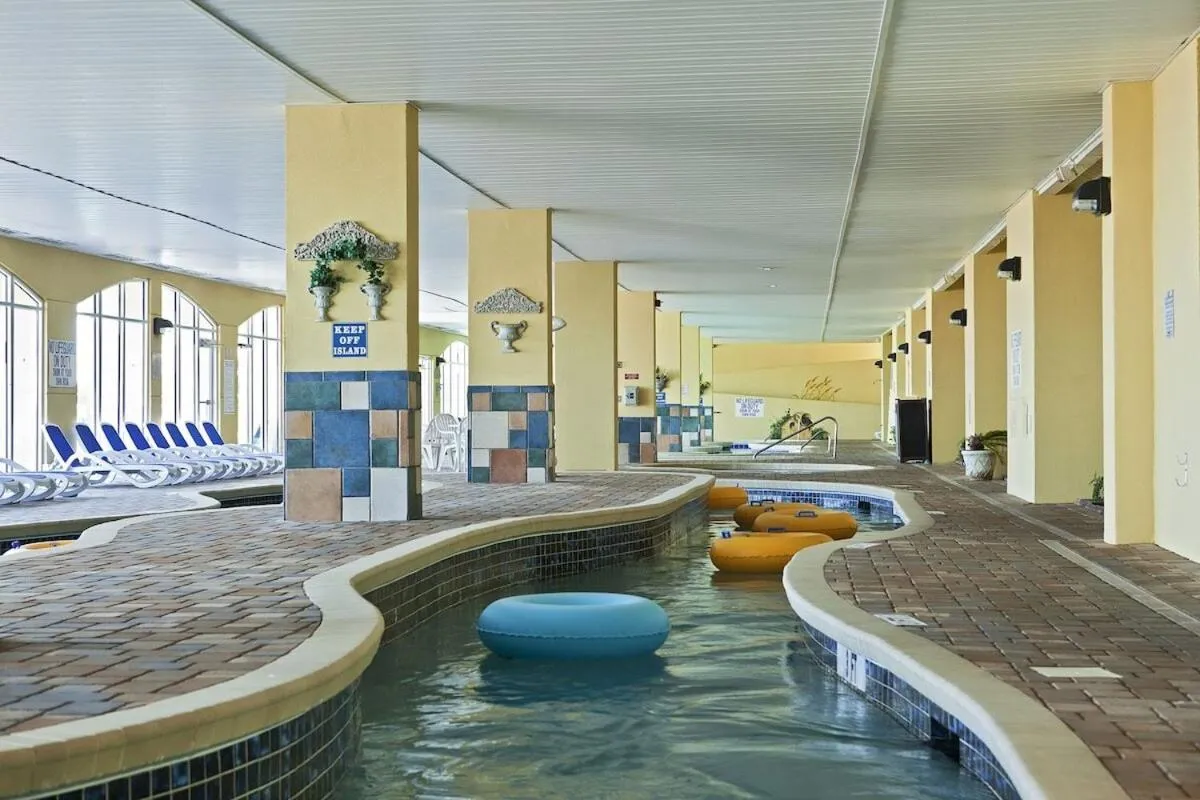 Swimming pool in Camelot By The Sea - Blue Palmetto Vacation Rentals