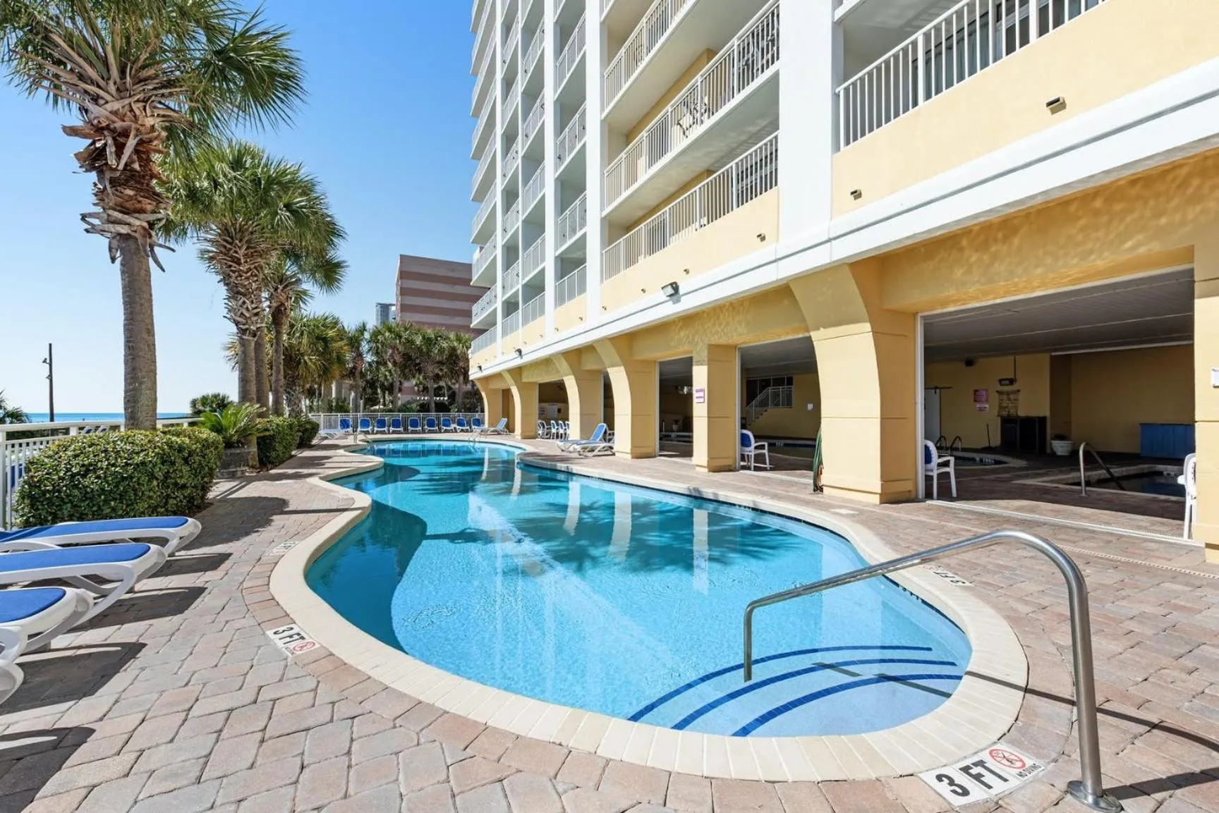 Pool view in Camelot By The Sea - Blue Palmetto Vacation Rentals