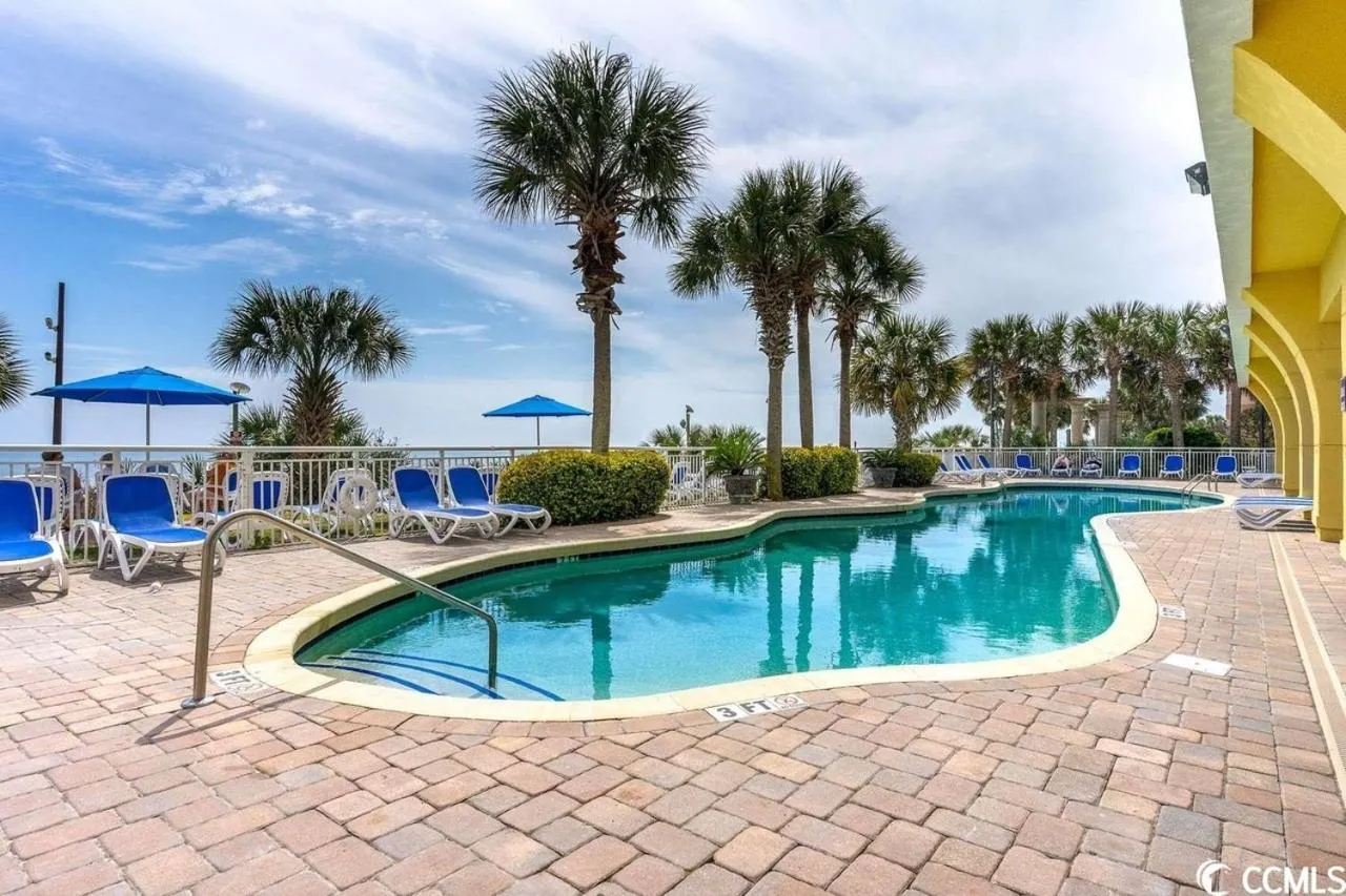 Pool view in Camelot By The Sea - Blue Palmetto Vacation Rentals