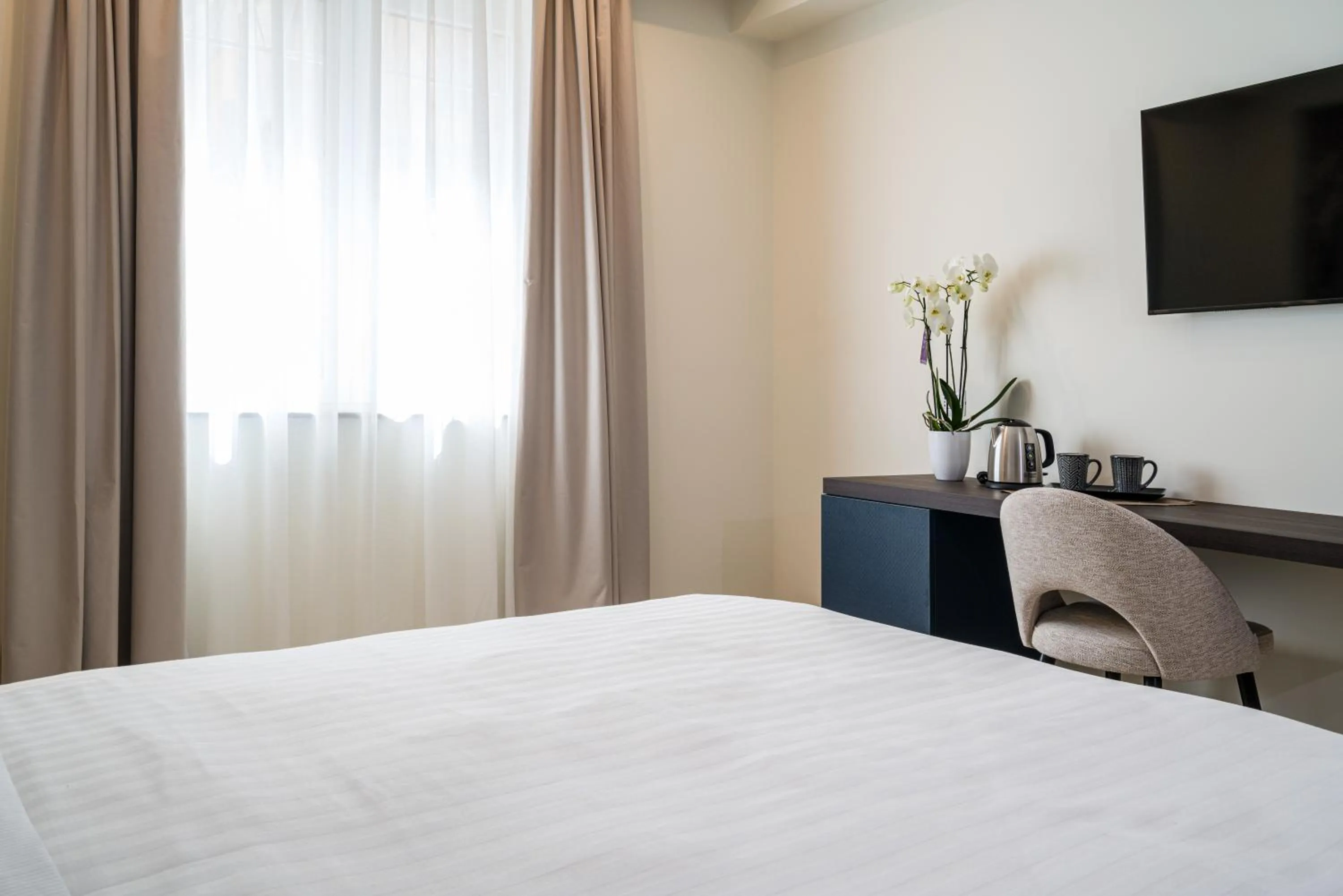 TV and multimedia, Bed in I Due Mori - Luxury Rooms