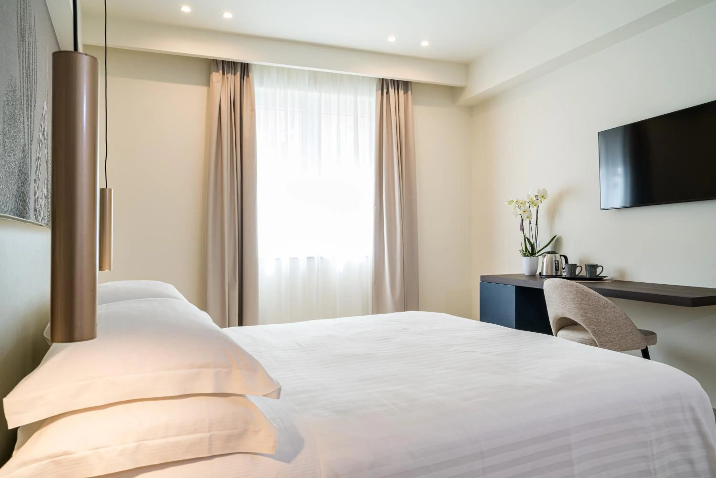 TV and multimedia, Bed in I Due Mori - Luxury Rooms