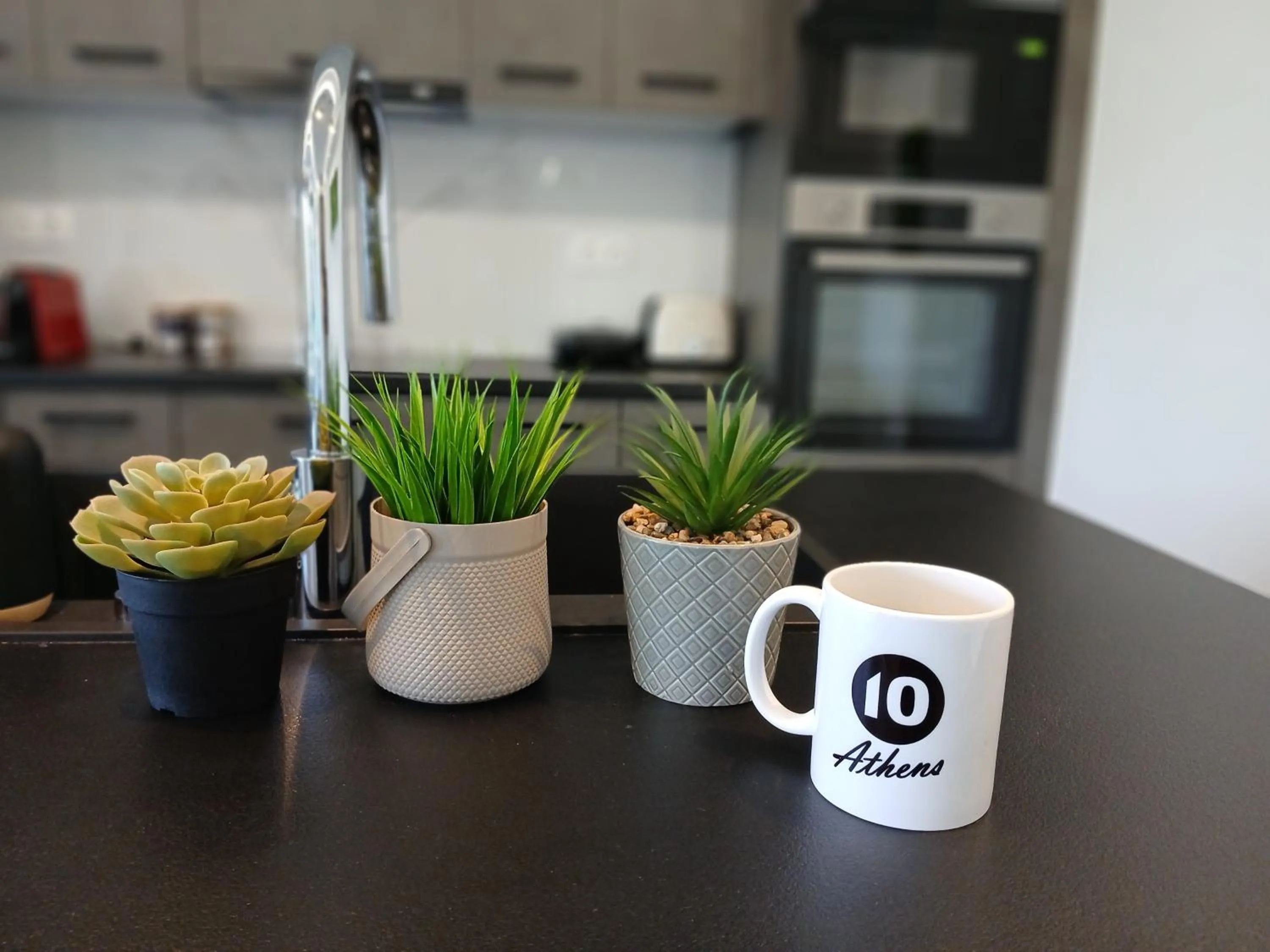 Logo/Certificate/Sign in 10 Apartments & Suites Athens