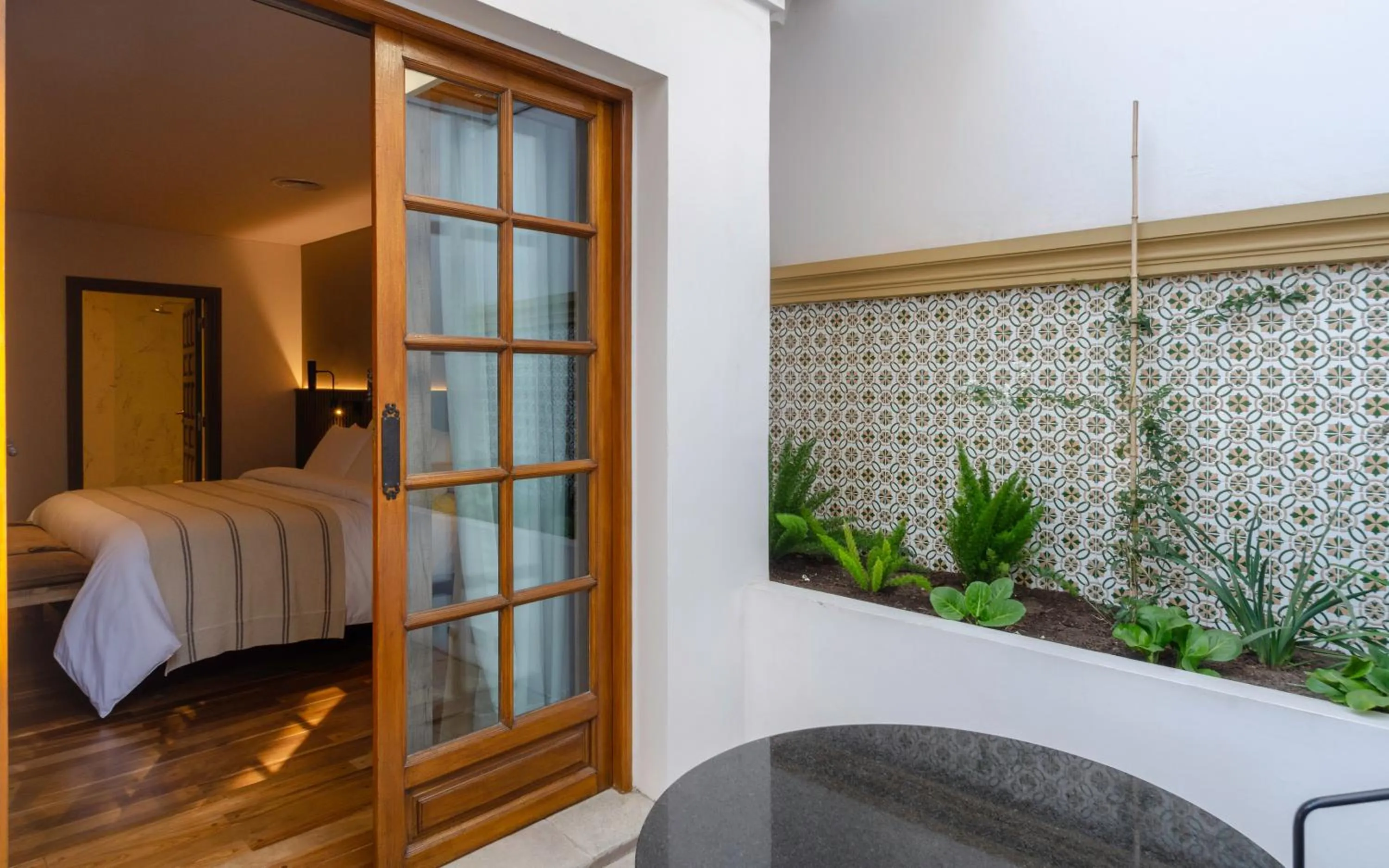 Bed in El Bodeguero Hotel