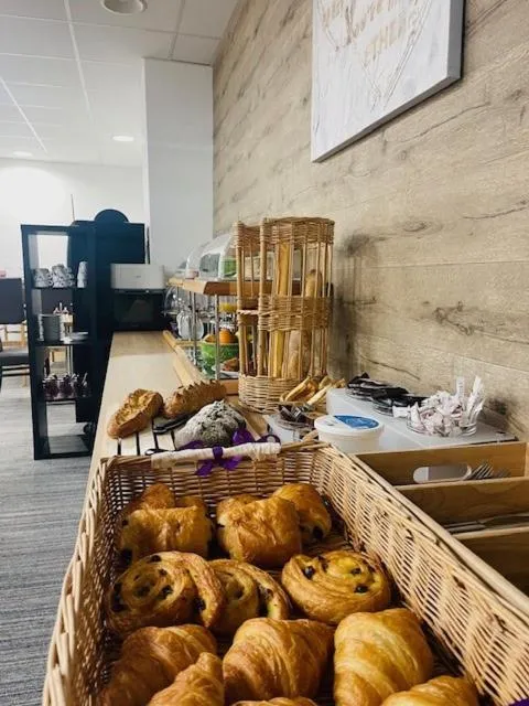 Buffet breakfast in Logis Hôtel Le Bocage