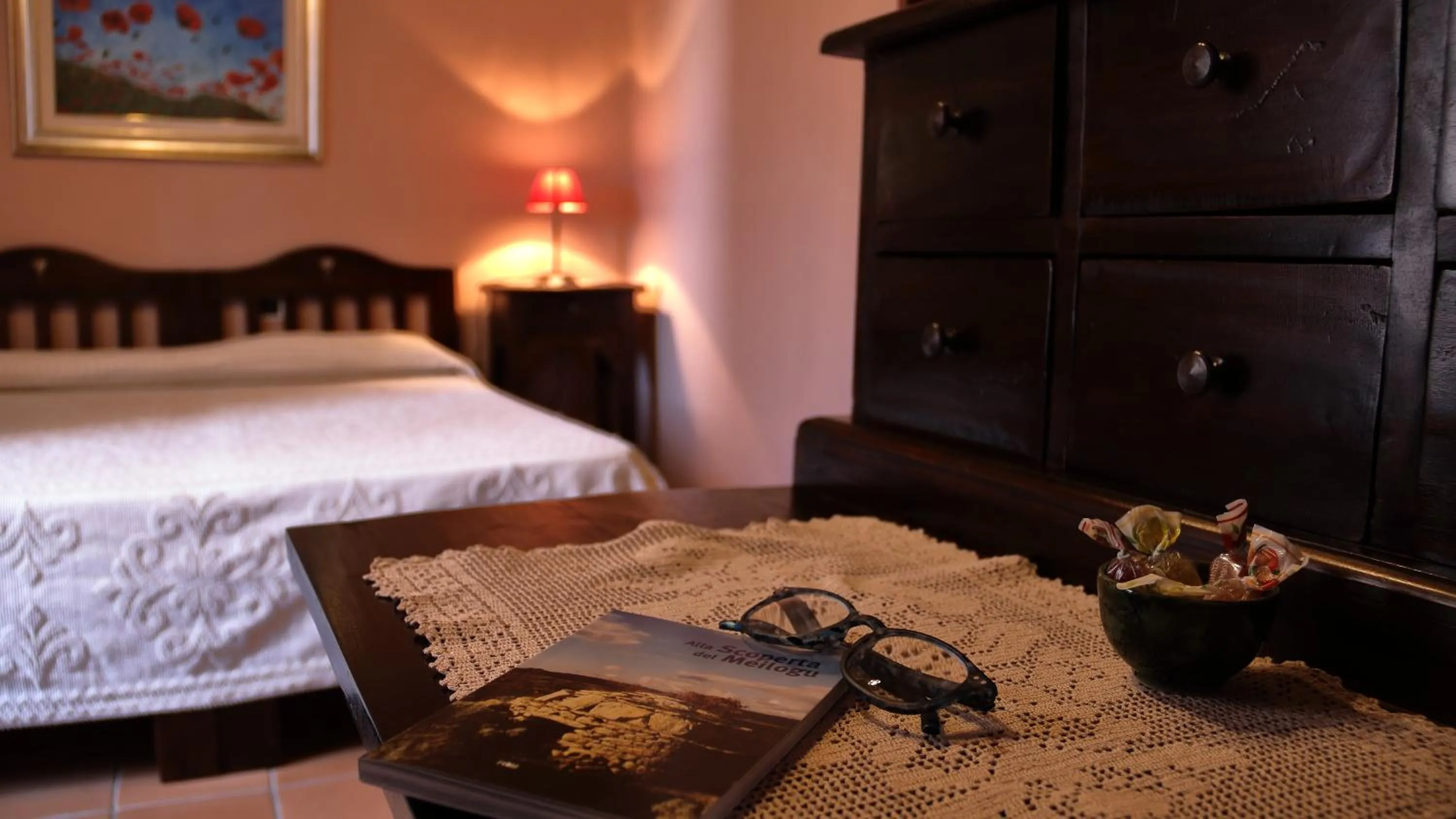 Decorative detail, Bed in B&B S'Asilo Sardegna