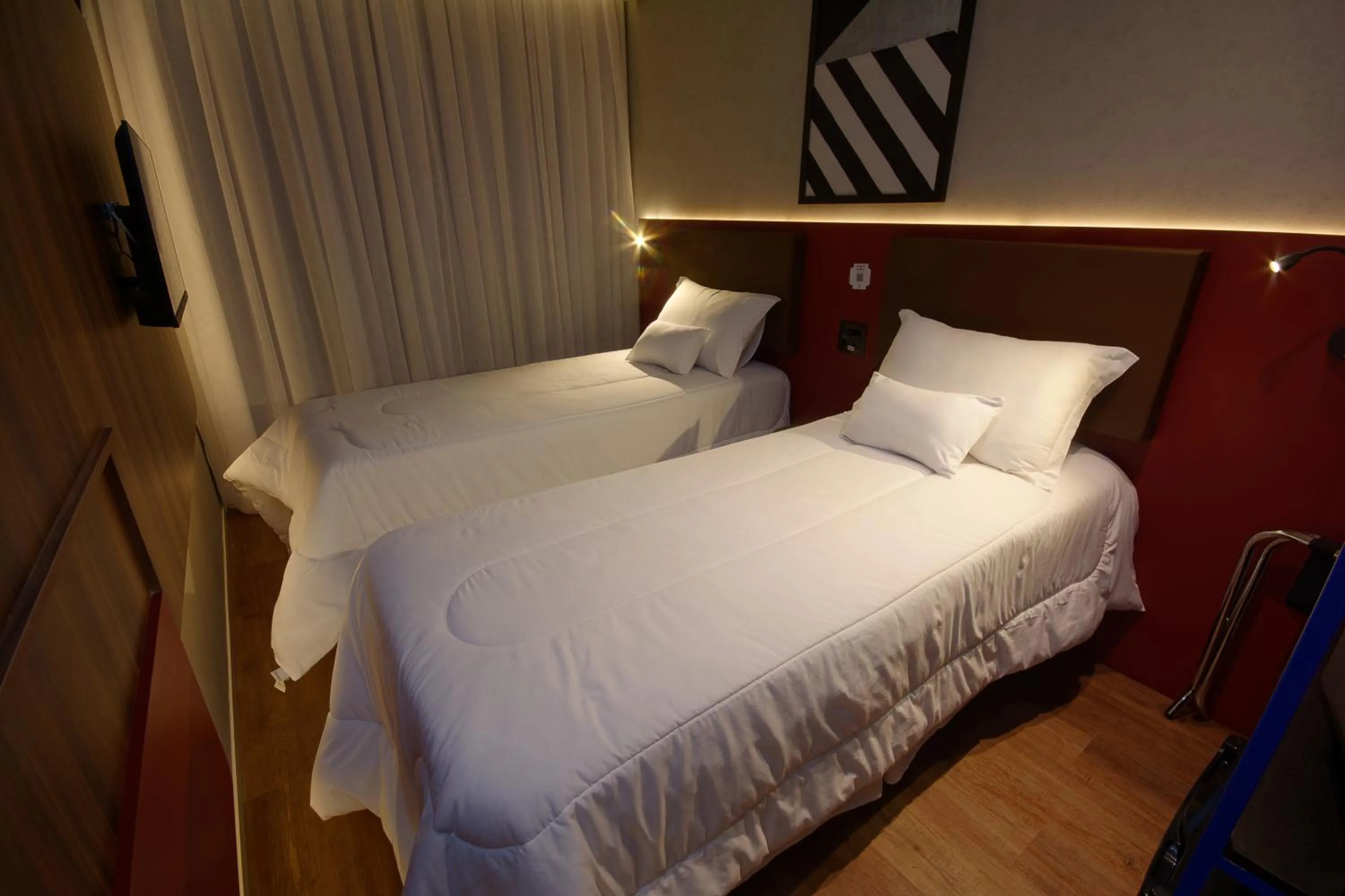 Bed in Golden Tower Express Nações Unidas by Fênix Hotéis