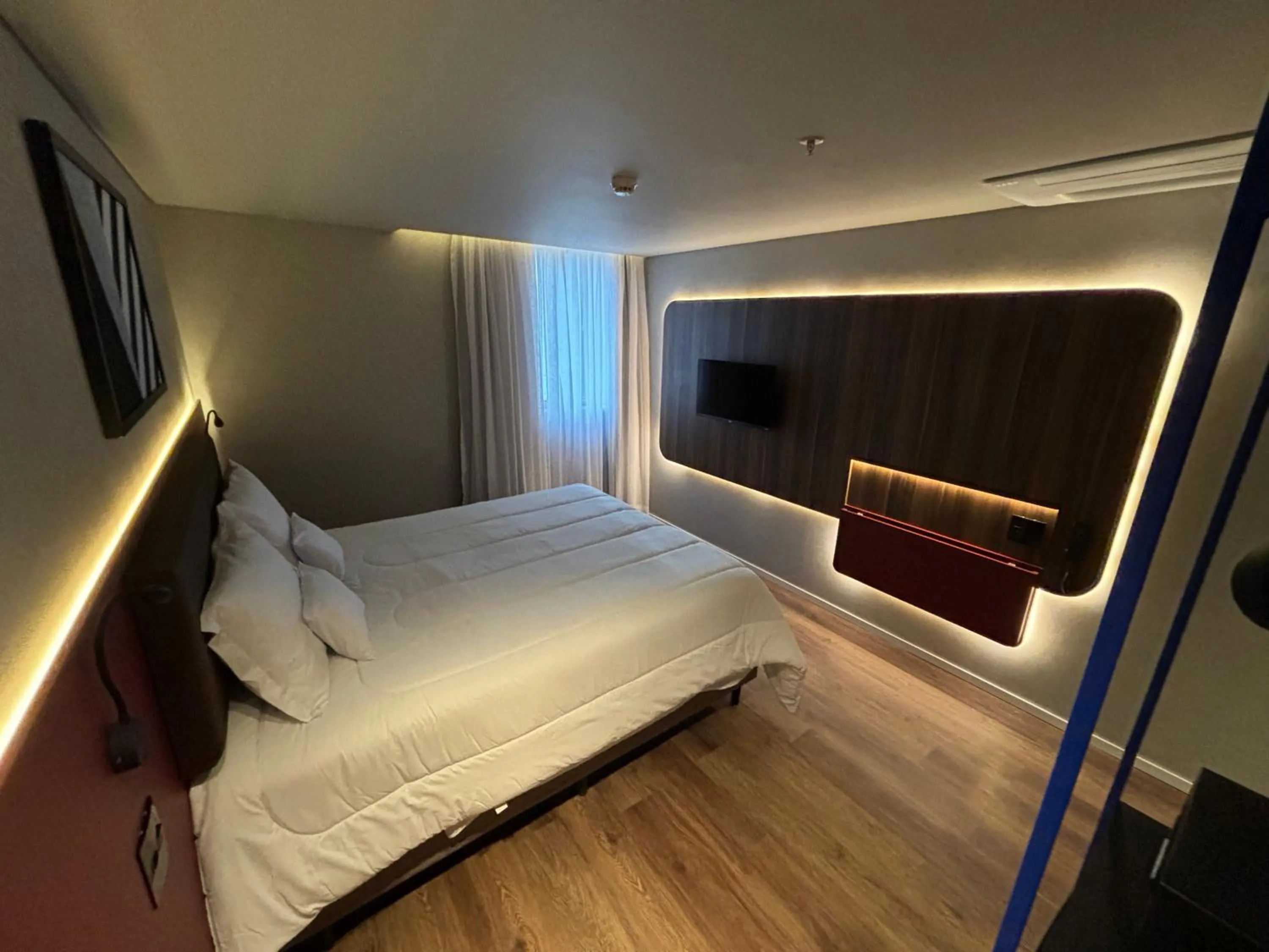 Bed in Golden Tower Express Nações Unidas by Fênix Hotéis