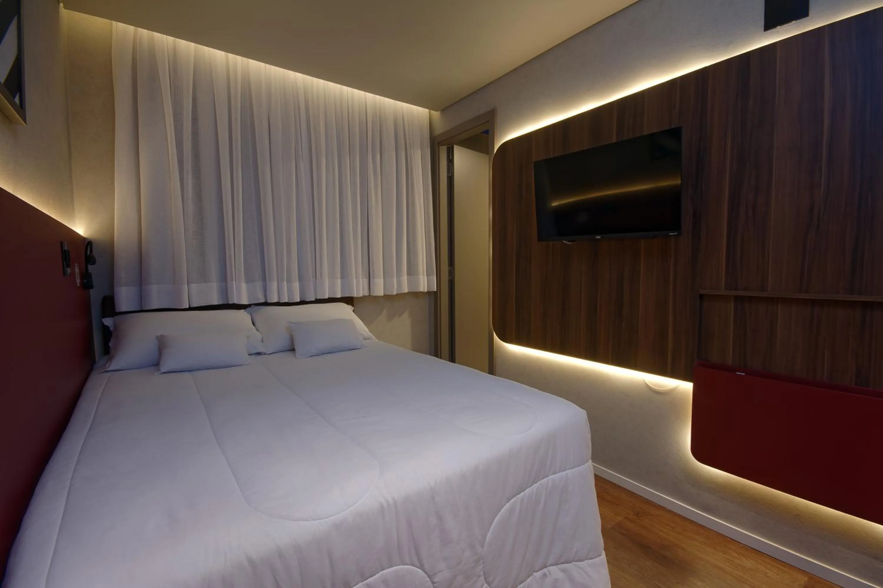 Bed in Golden Tower Express Nações Unidas by Fênix Hotéis