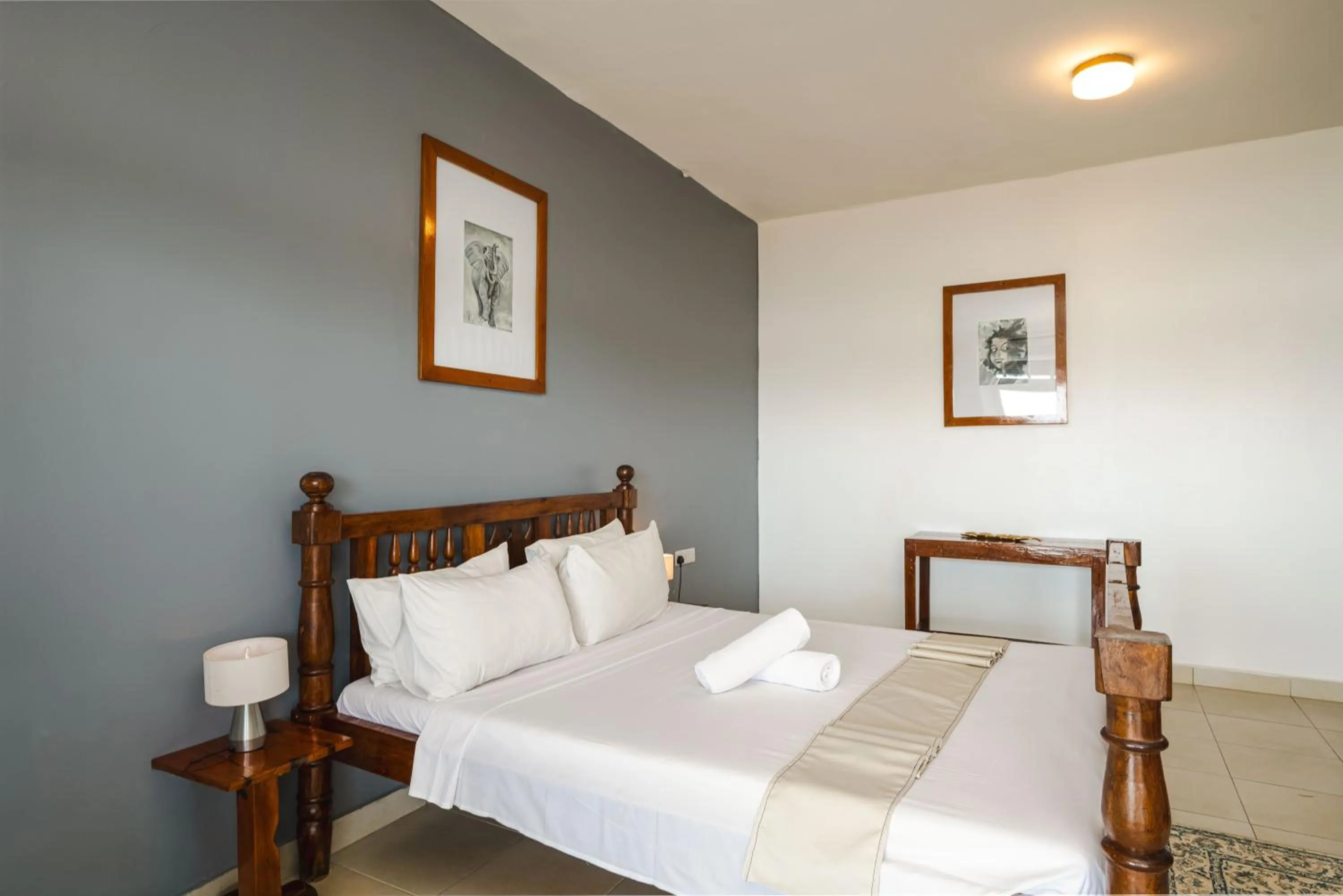 Bed in Tanzanite Beach Resort