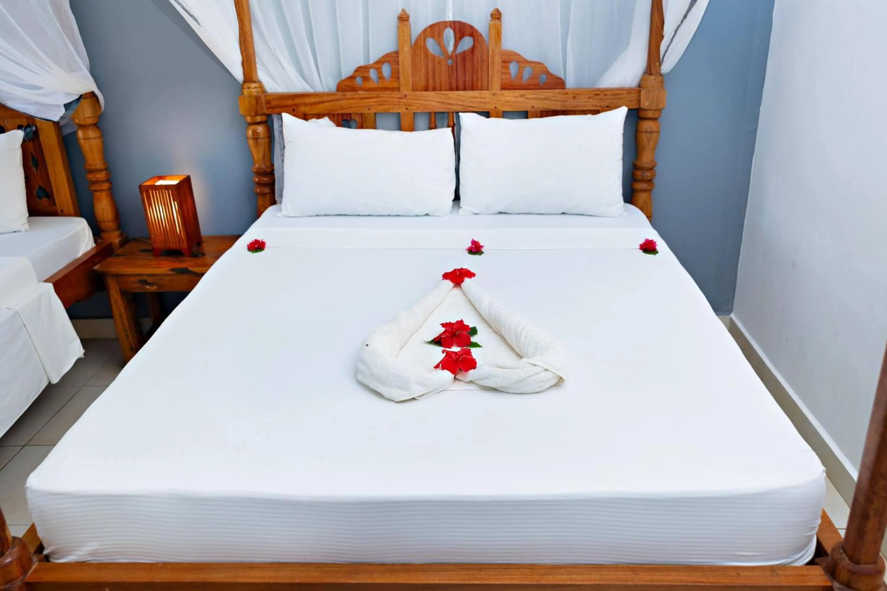 Bed in Tanzanite Beach Resort