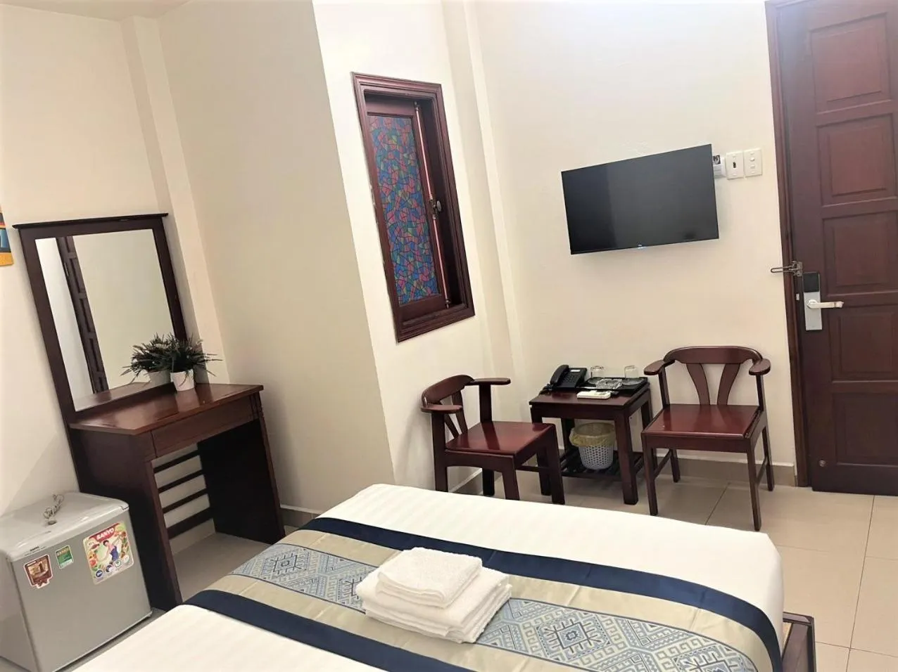 Bed in DINH DINH 2 AIRPORT HOTEL