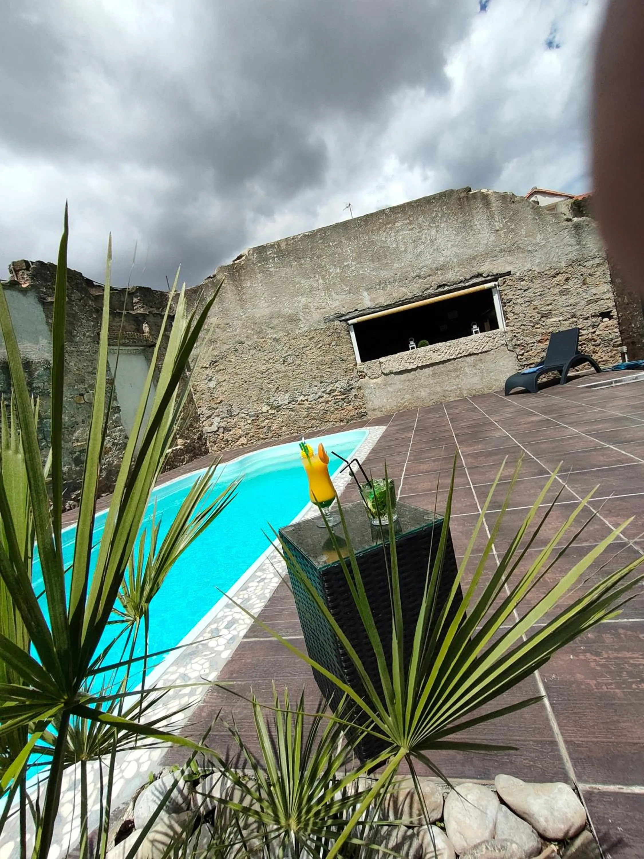 Swimming pool in Hôtel Restaurant L'Art des Mets by Côté Jardin