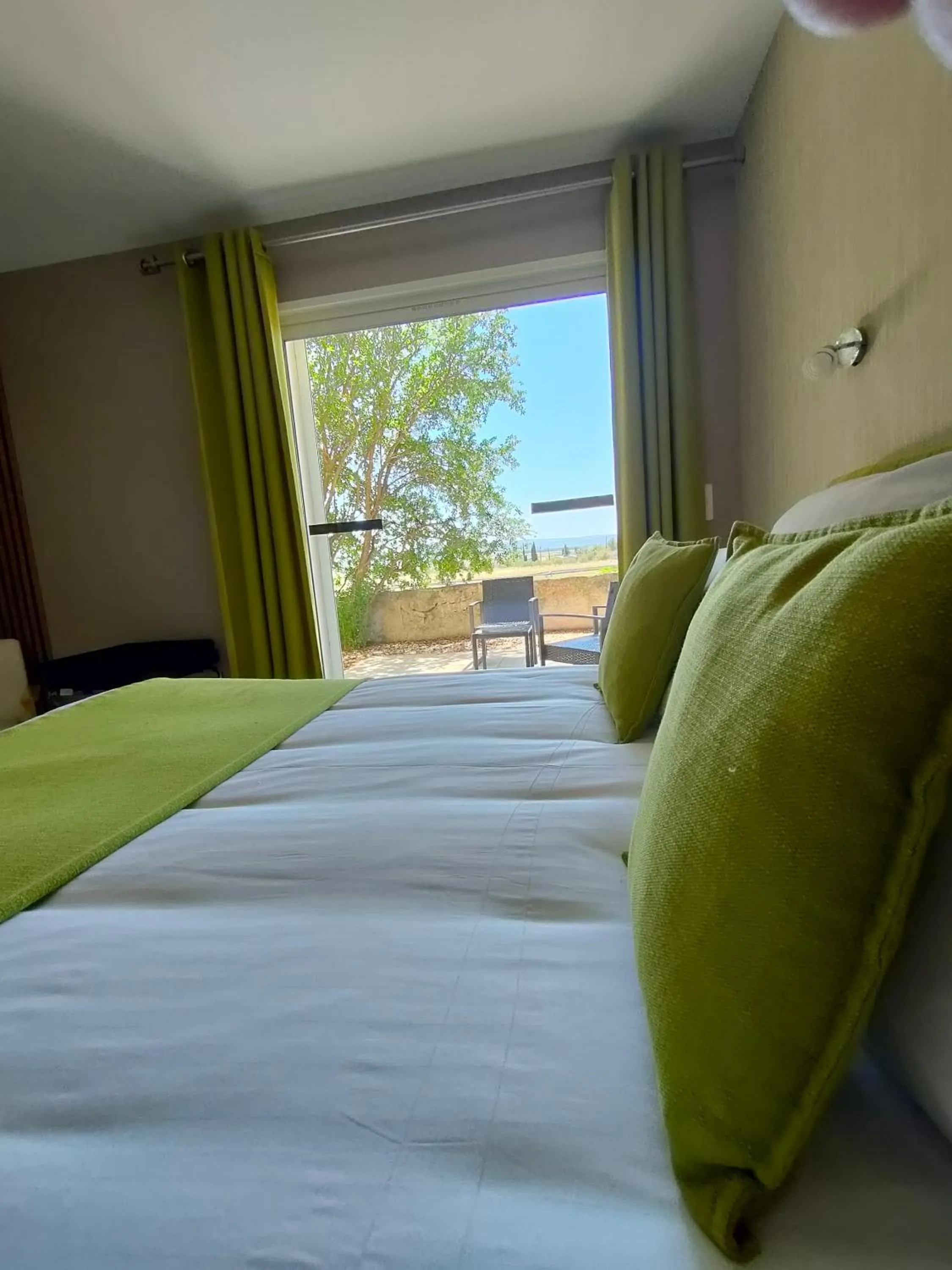 Bed in Hôtel Restaurant L'Art des Mets by Côté Jardin