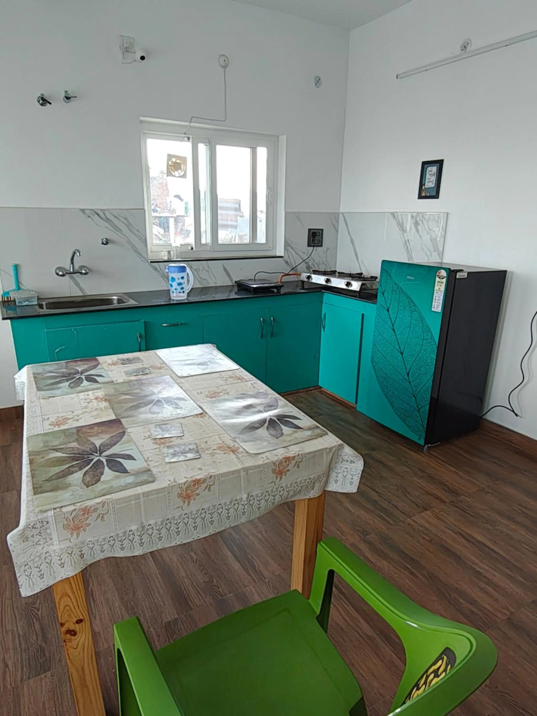 Kitchen or kitchenette in Abhi's Cottage