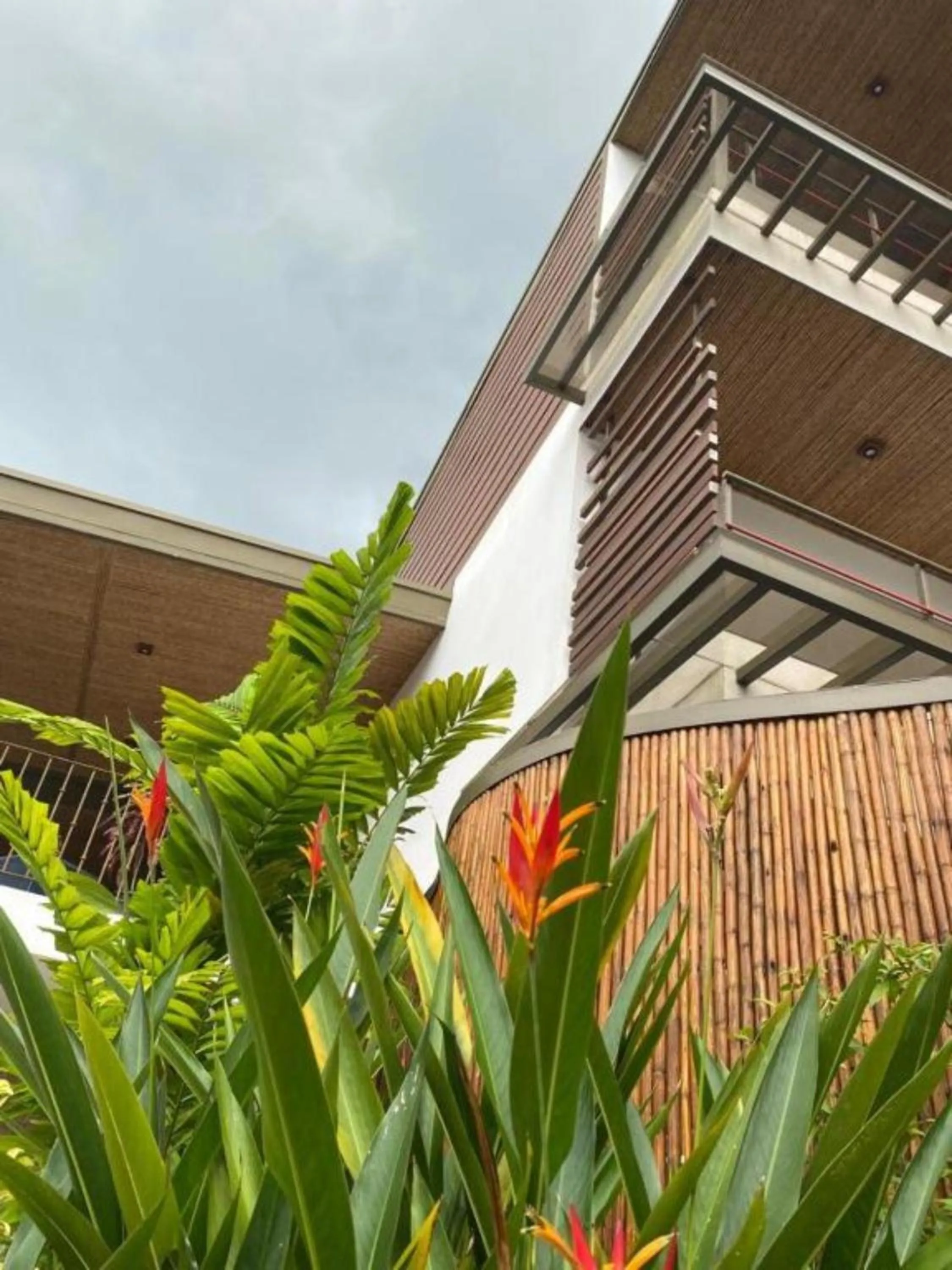 Property building in La Fortuna Lodge by Treebu Hotels