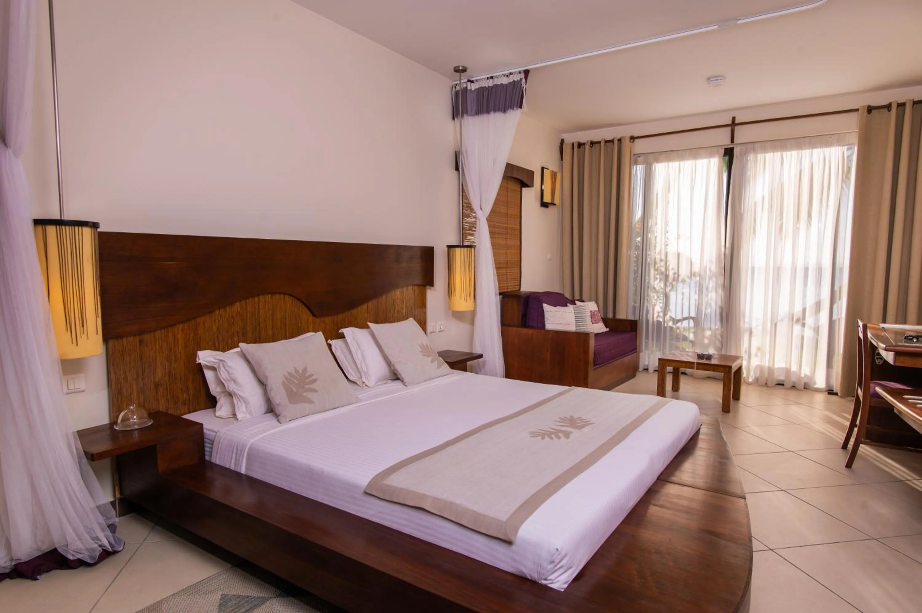 Bed in Mantis Soanambo Hotel And Spa