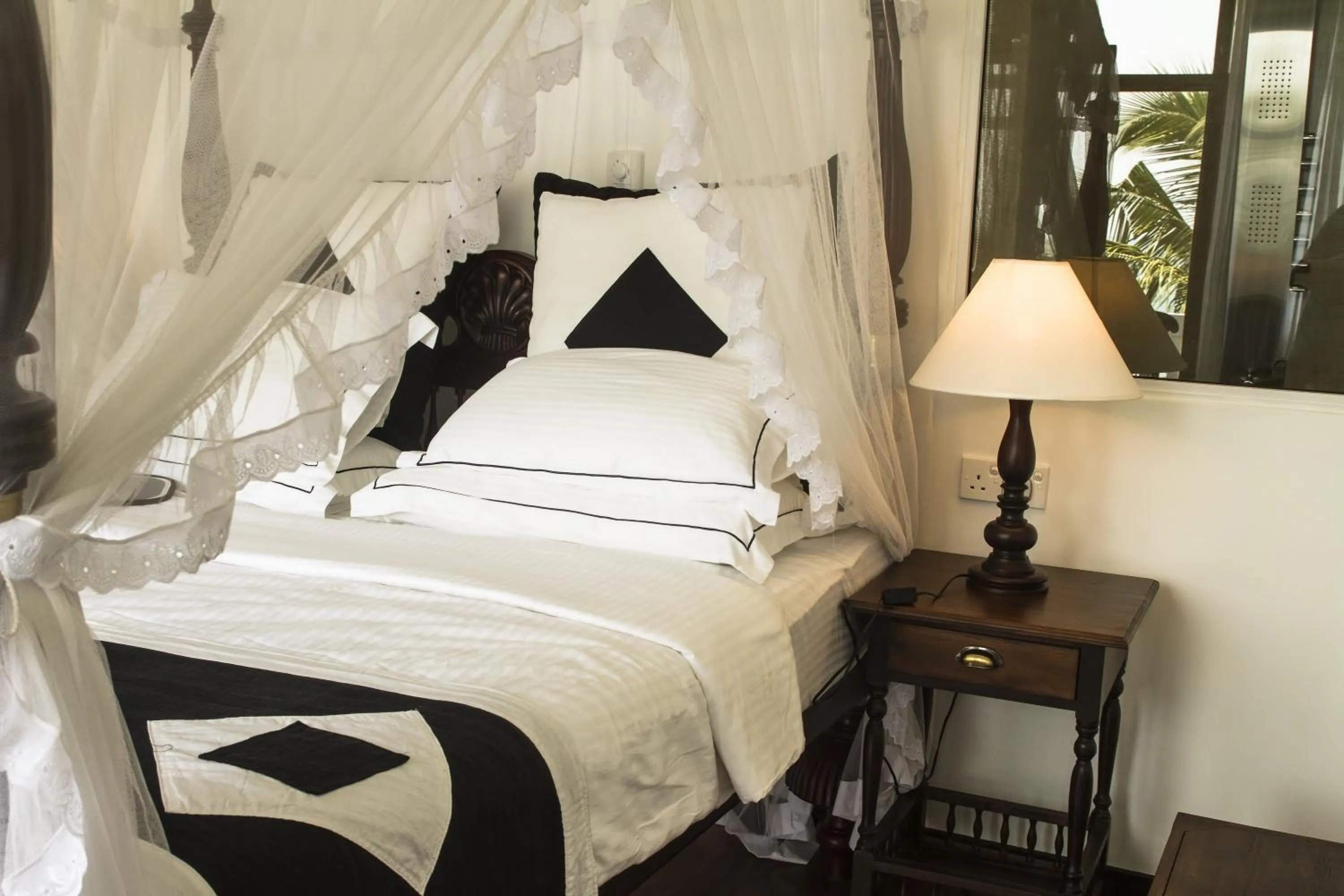 Bed in Sea World Boutique Hotel