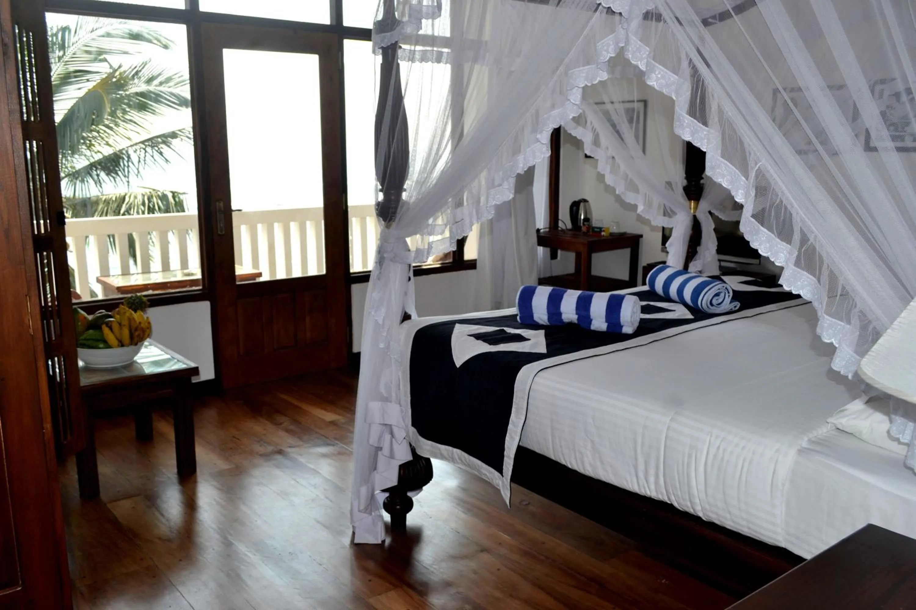 Photo of the whole room, Bed in Sea World Boutique Hotel