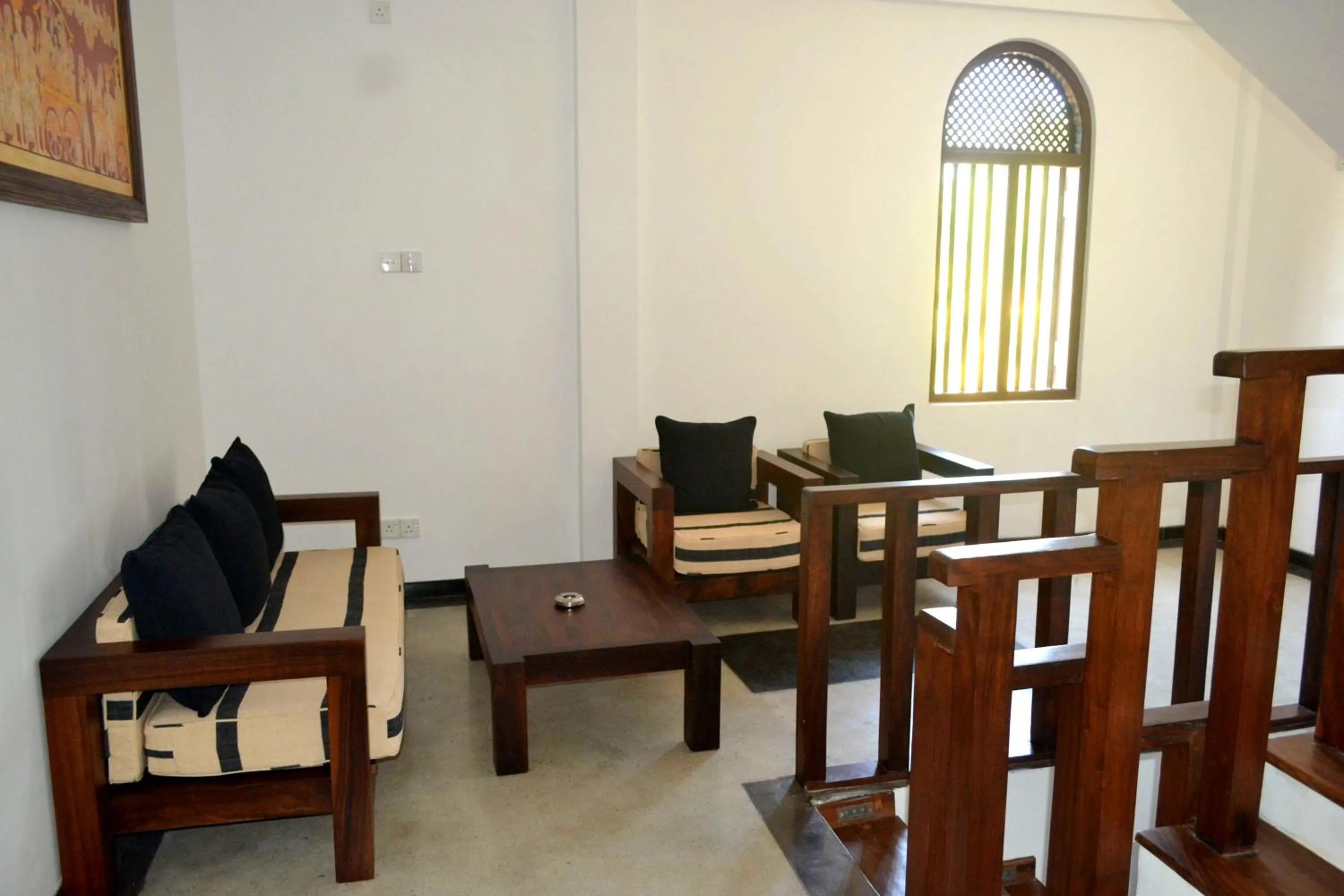 Seating area in Sea World Boutique Hotel