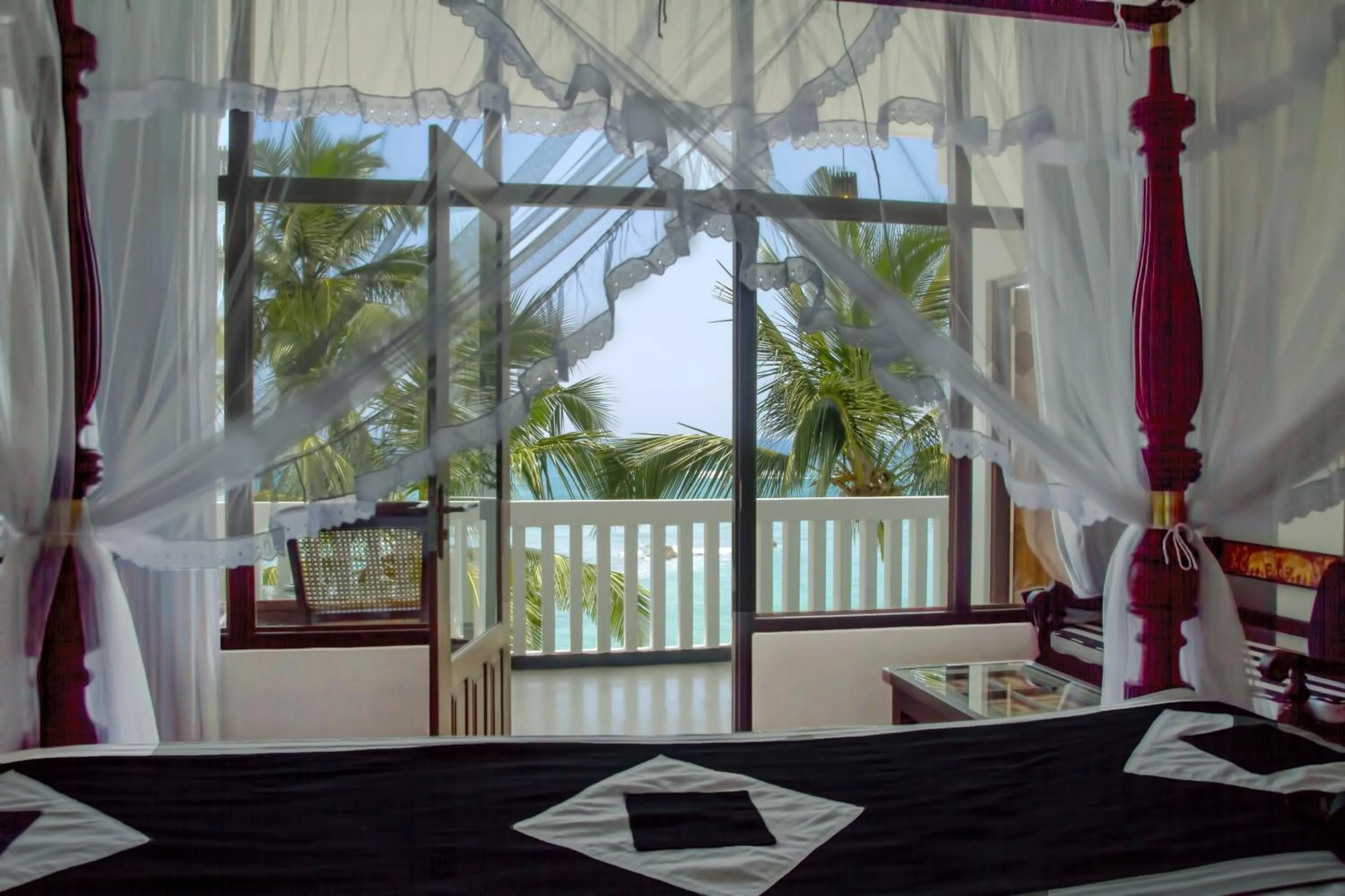 Bedroom in Sea World Boutique Hotel