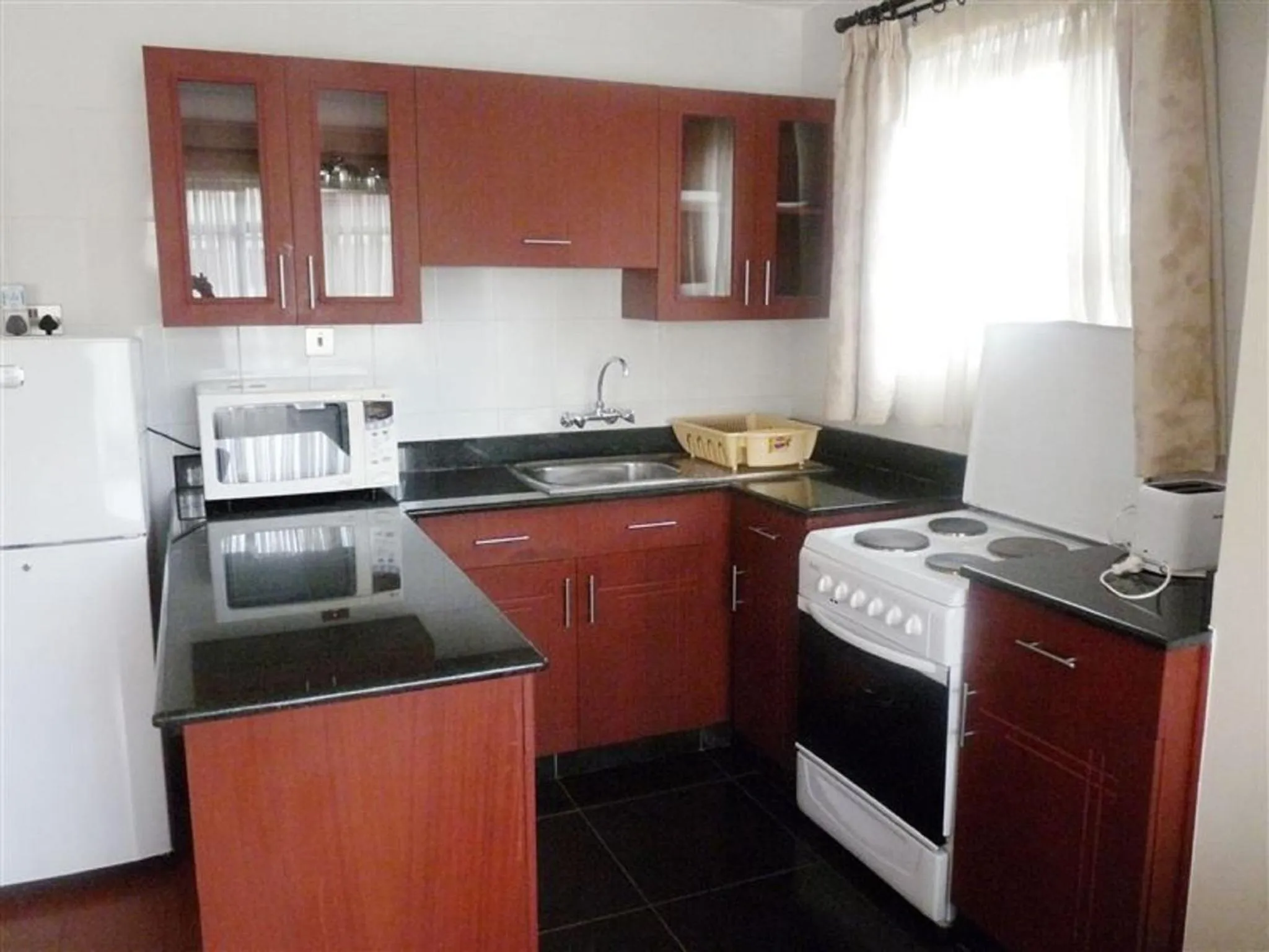 Kitchen or kitchenette in Norfolk Towers Serviced Apartment -Nairobi, City Centre CBD