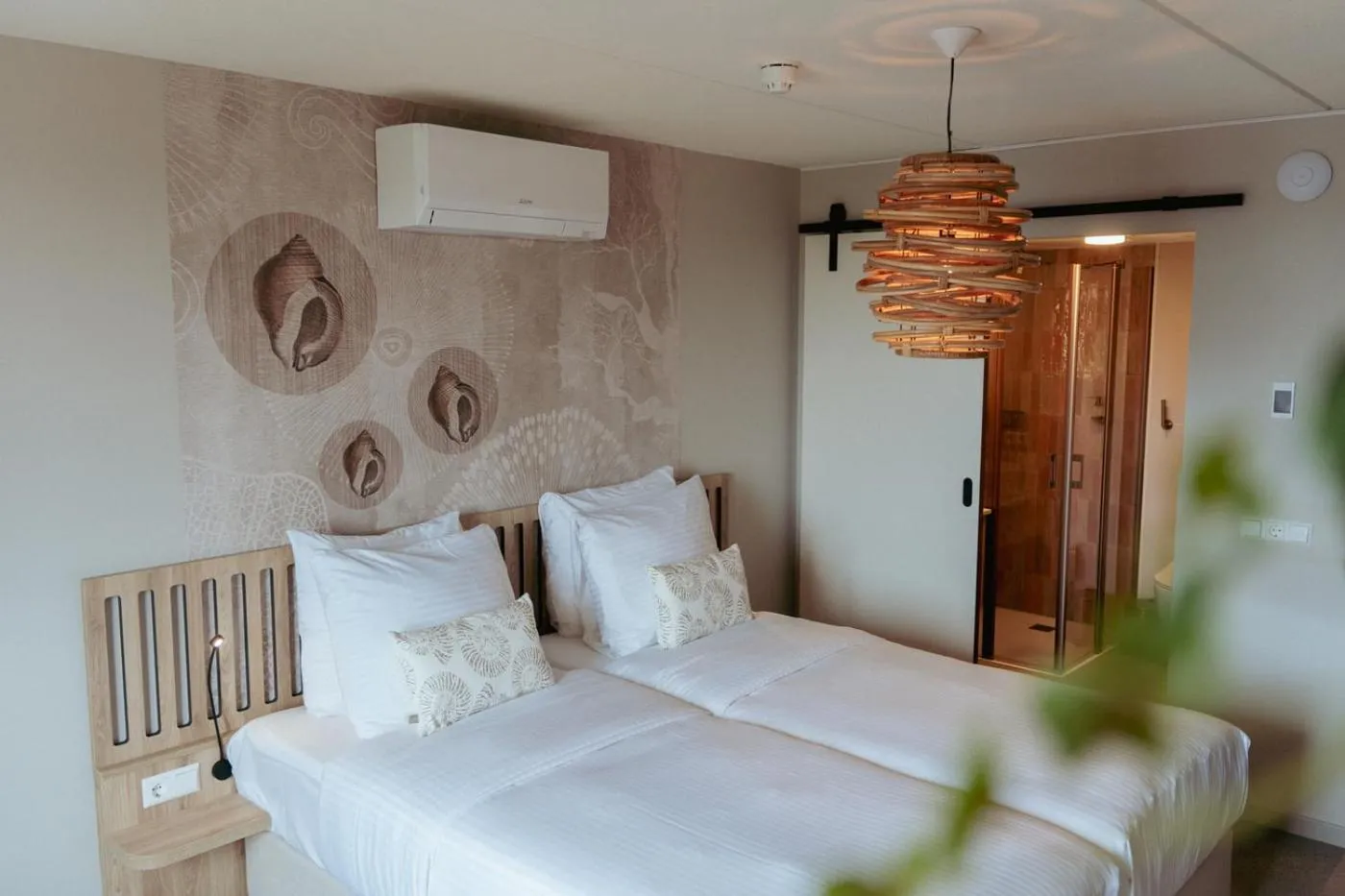 Bed in Beachfront Boutiquehotel