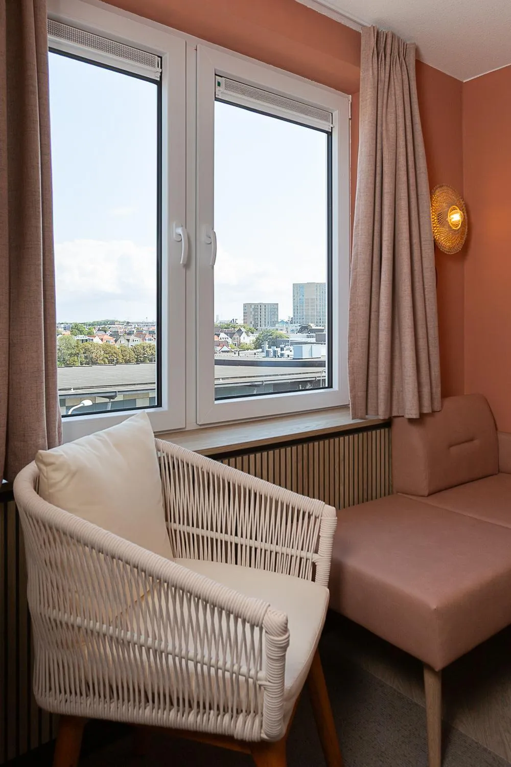 Seating area, Bed in Beachfront Boutiquehotel