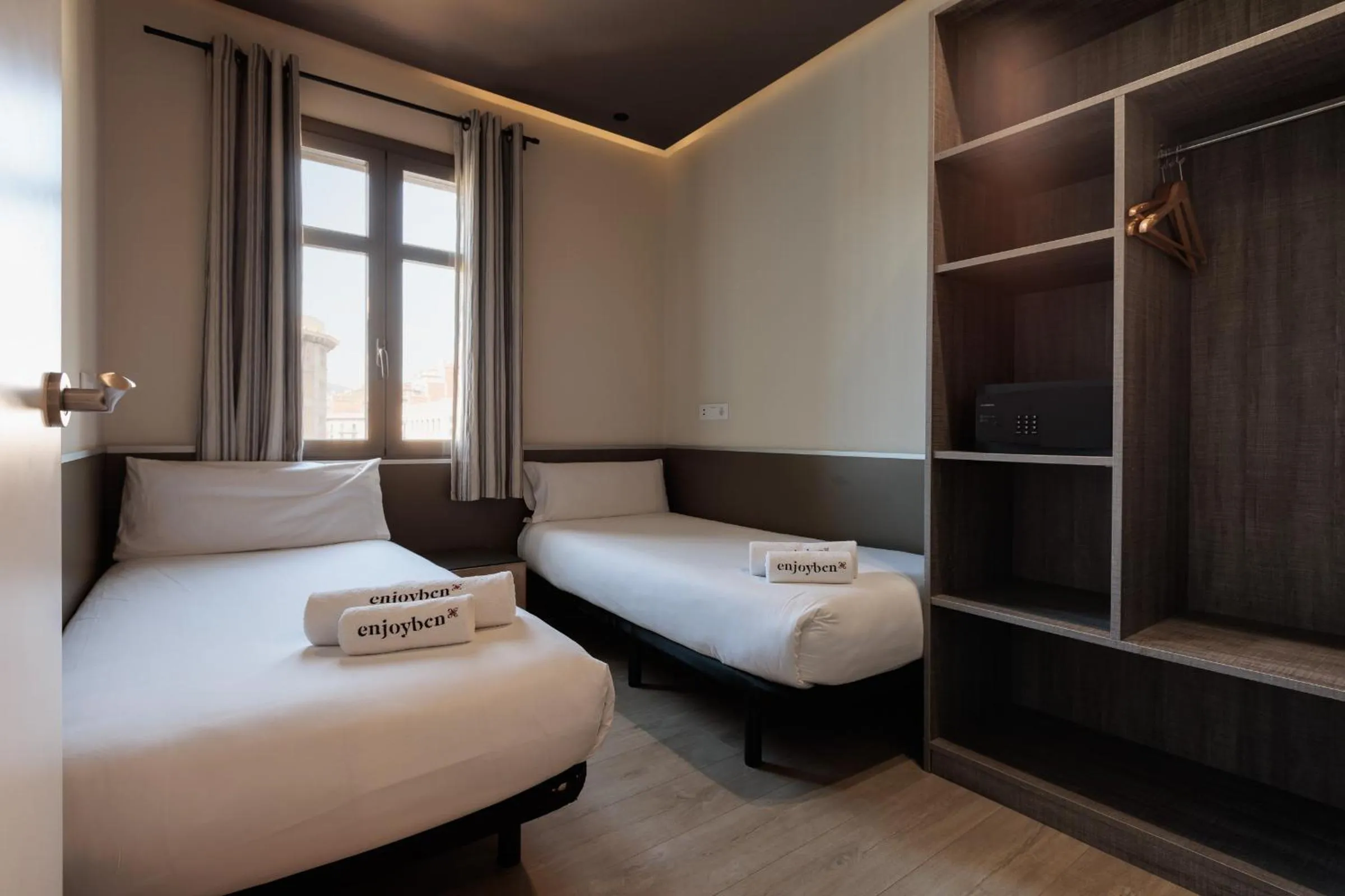 Bed in Enjoybcn Miro Apartments