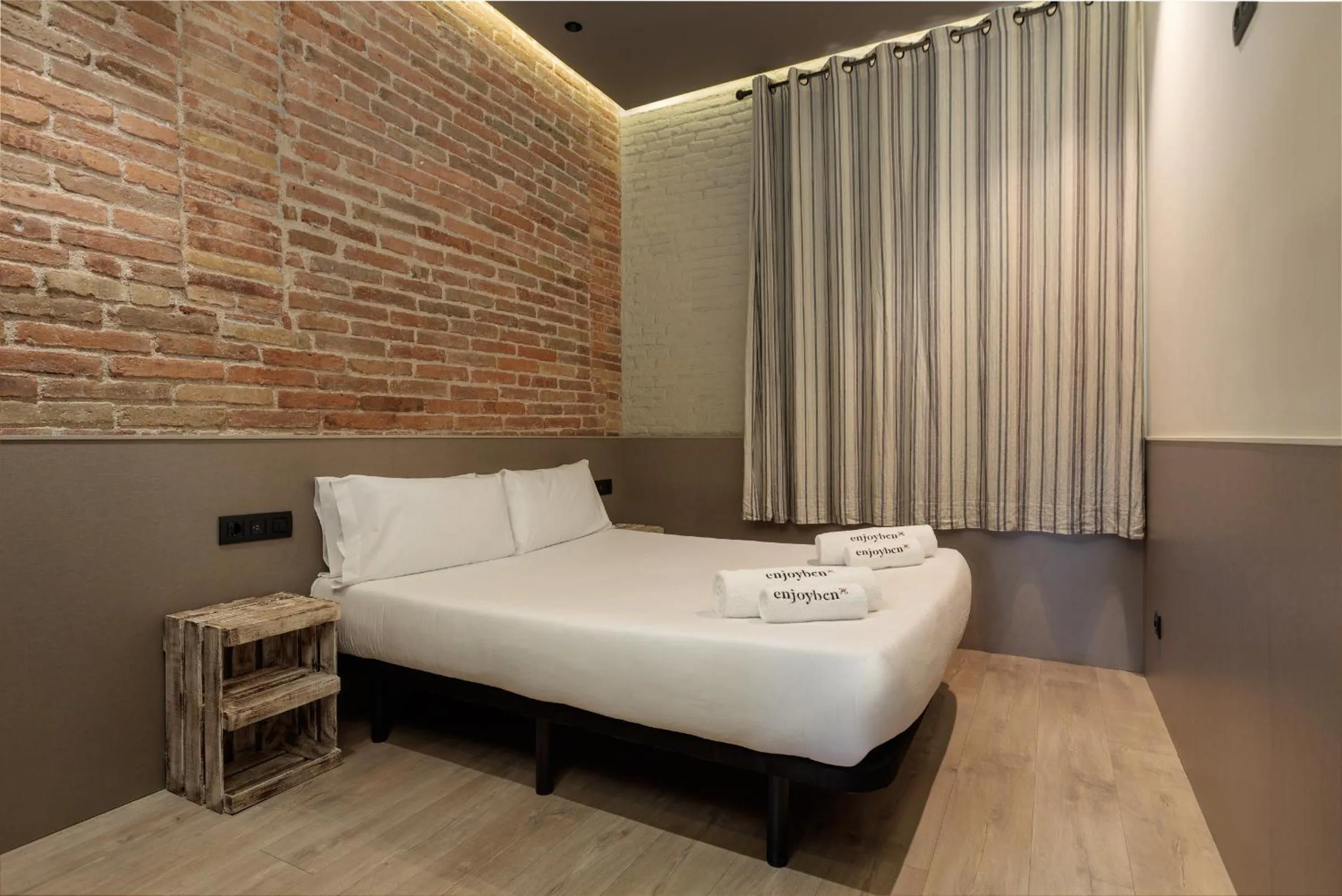 Bed in Enjoybcn Miro Apartments