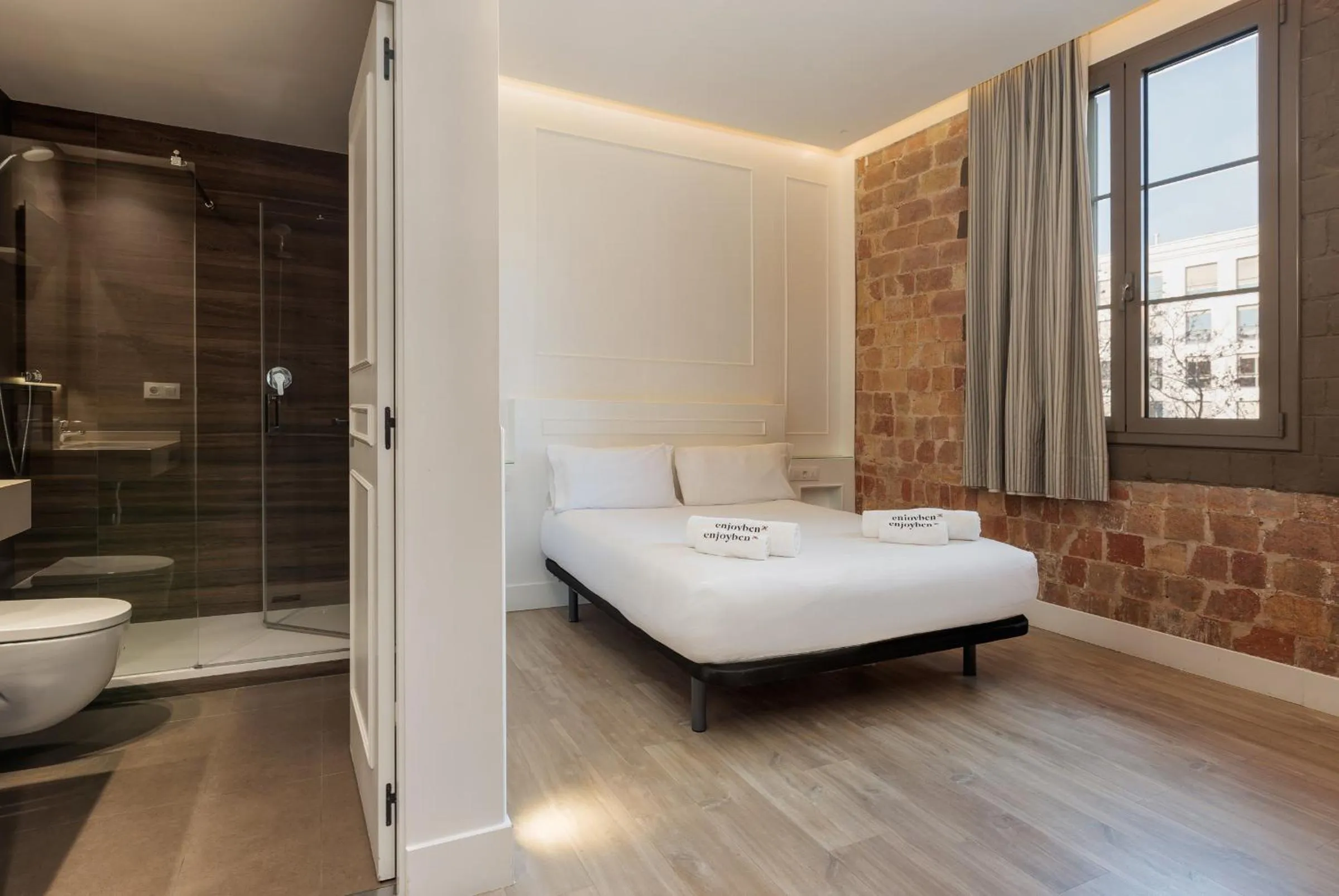 Bed in Enjoybcn Miro Apartments