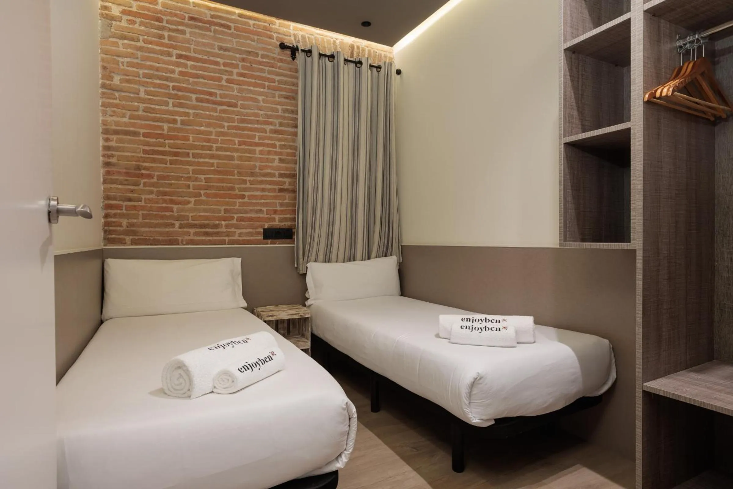 Bed in Enjoybcn Miro Apartments