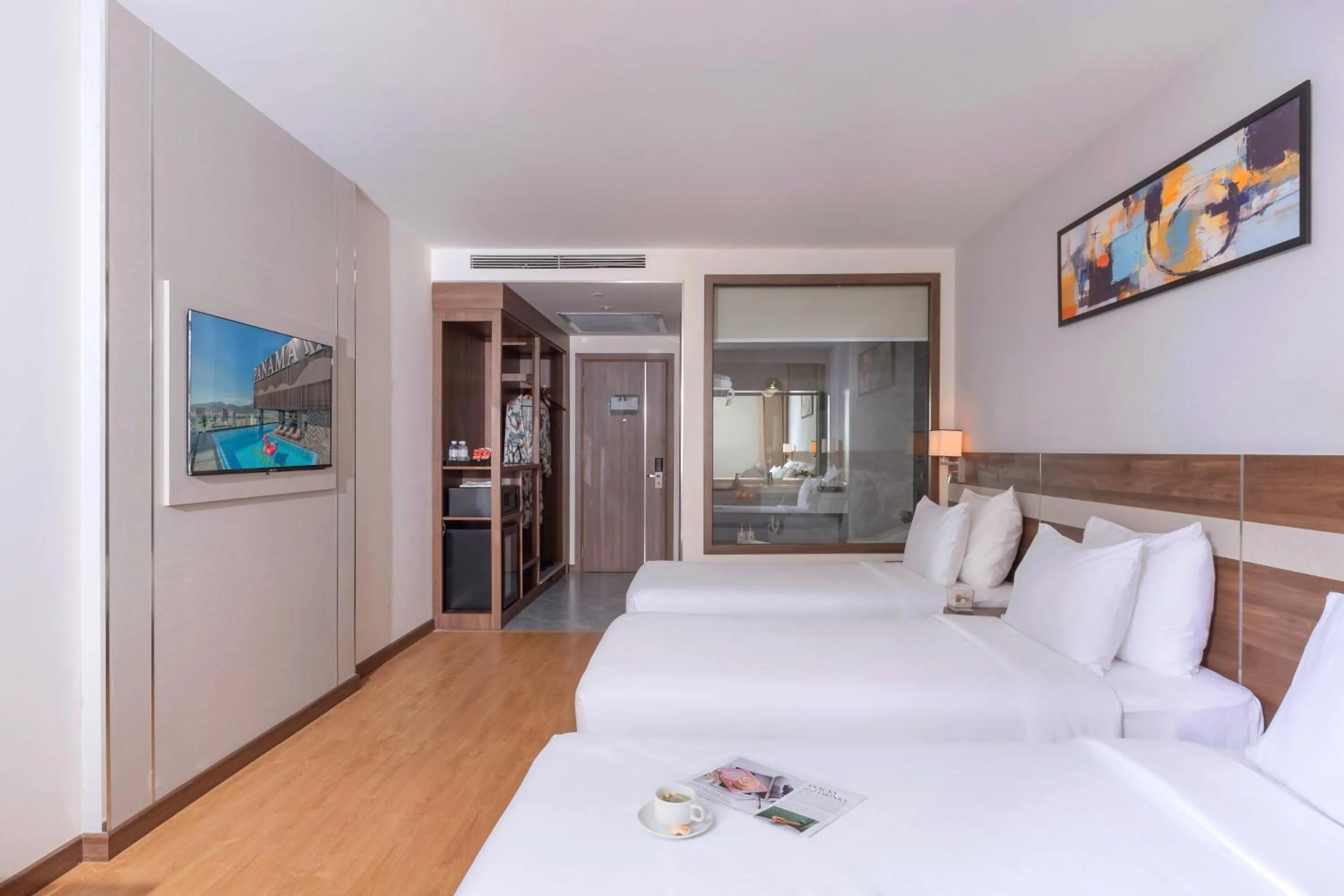 Kitchen or kitchenette, Bed in PANAMA Nha Trang Hotel