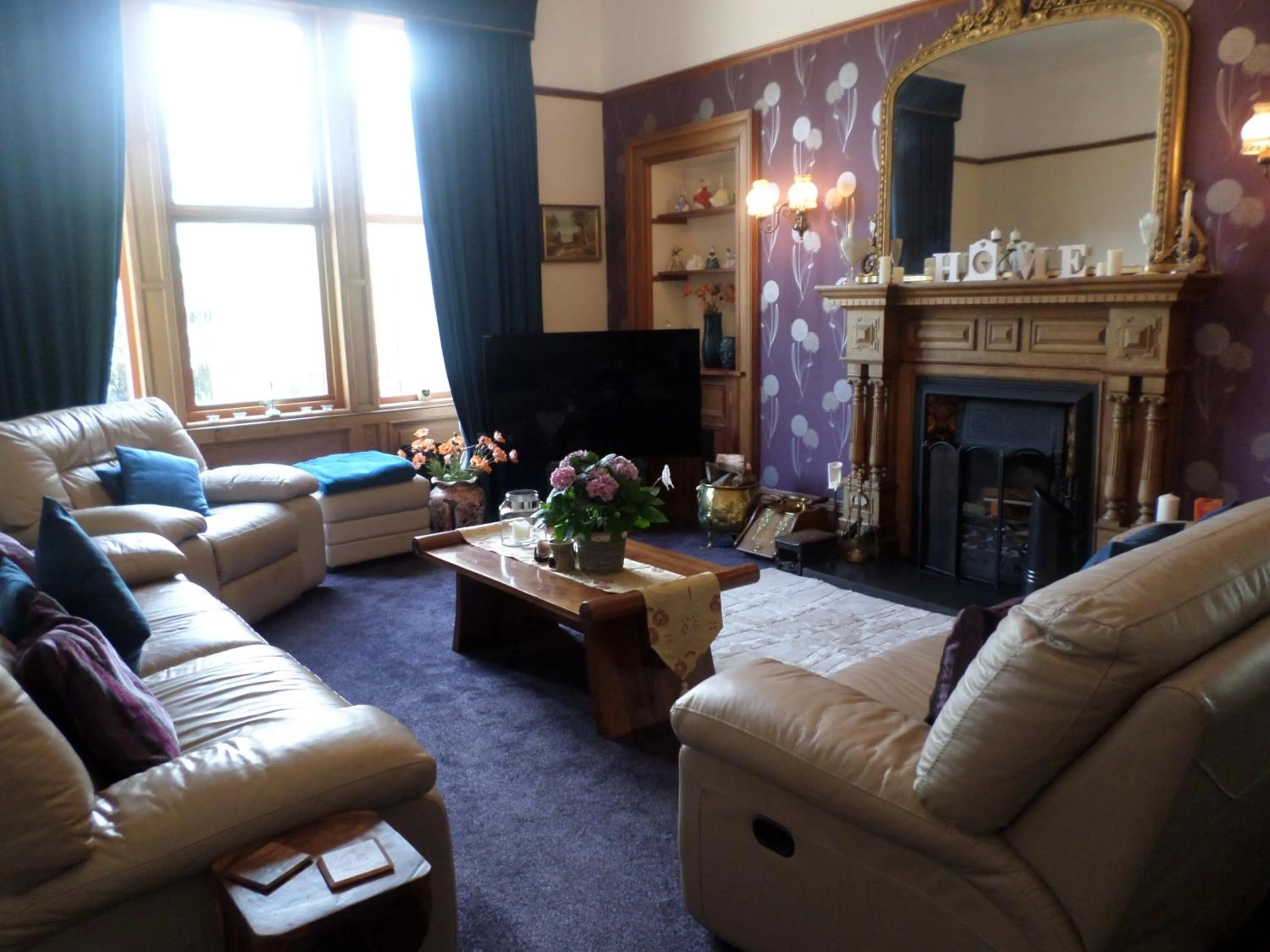 Communal lounge/ TV room in Camfield House