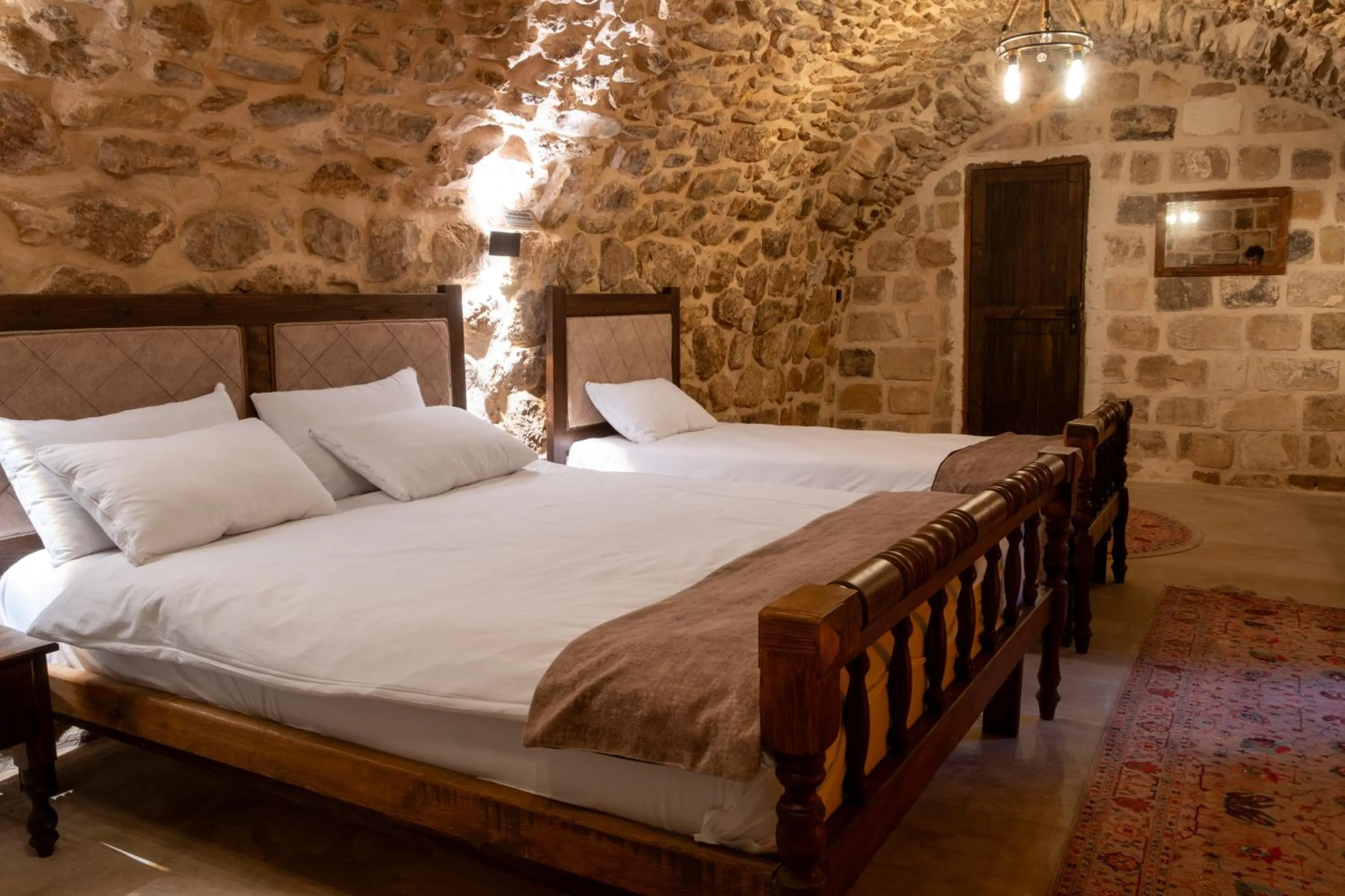 Bed in Marvel Hotel Mardin