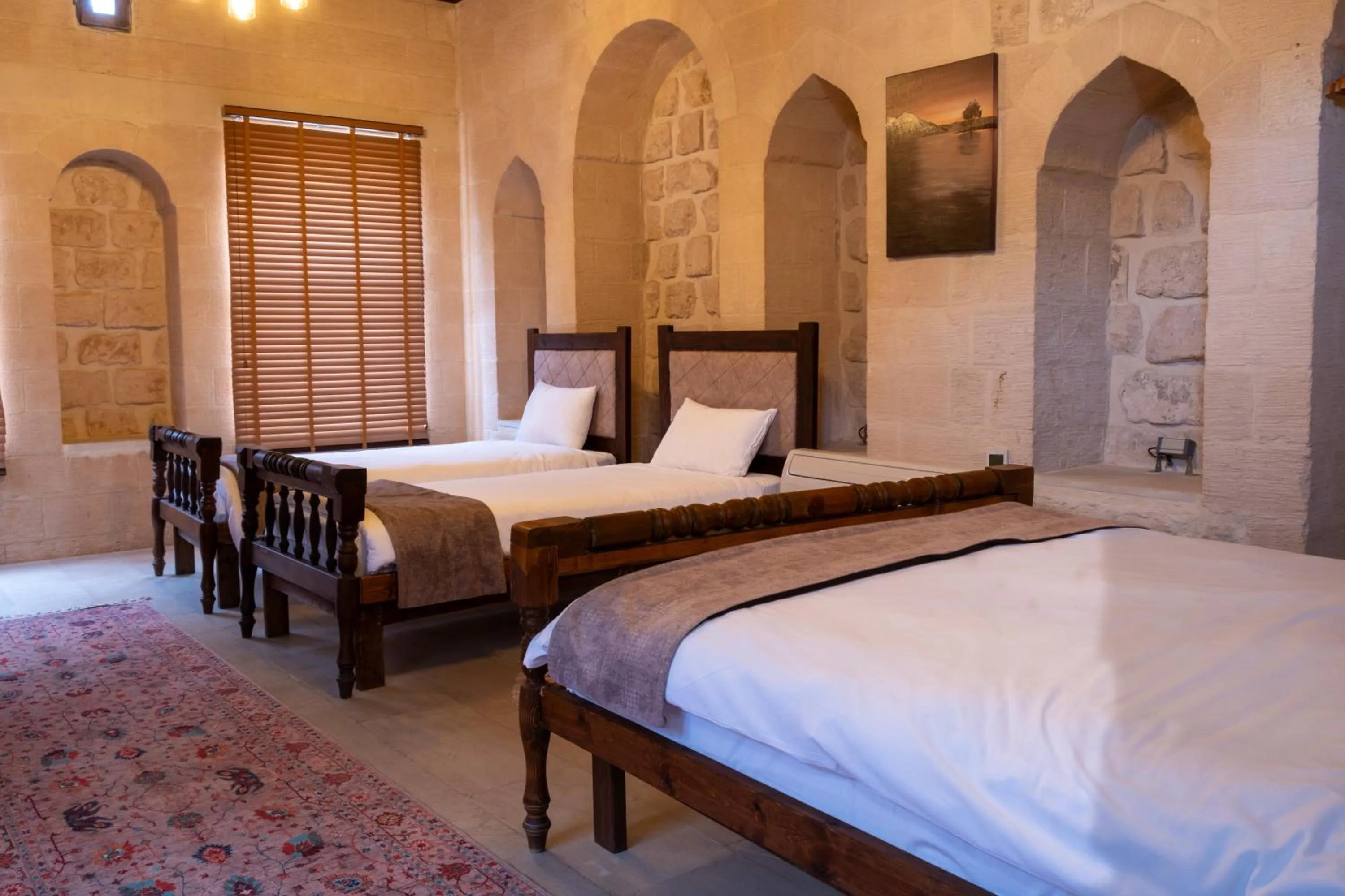 Bed in Marvel Hotel Mardin